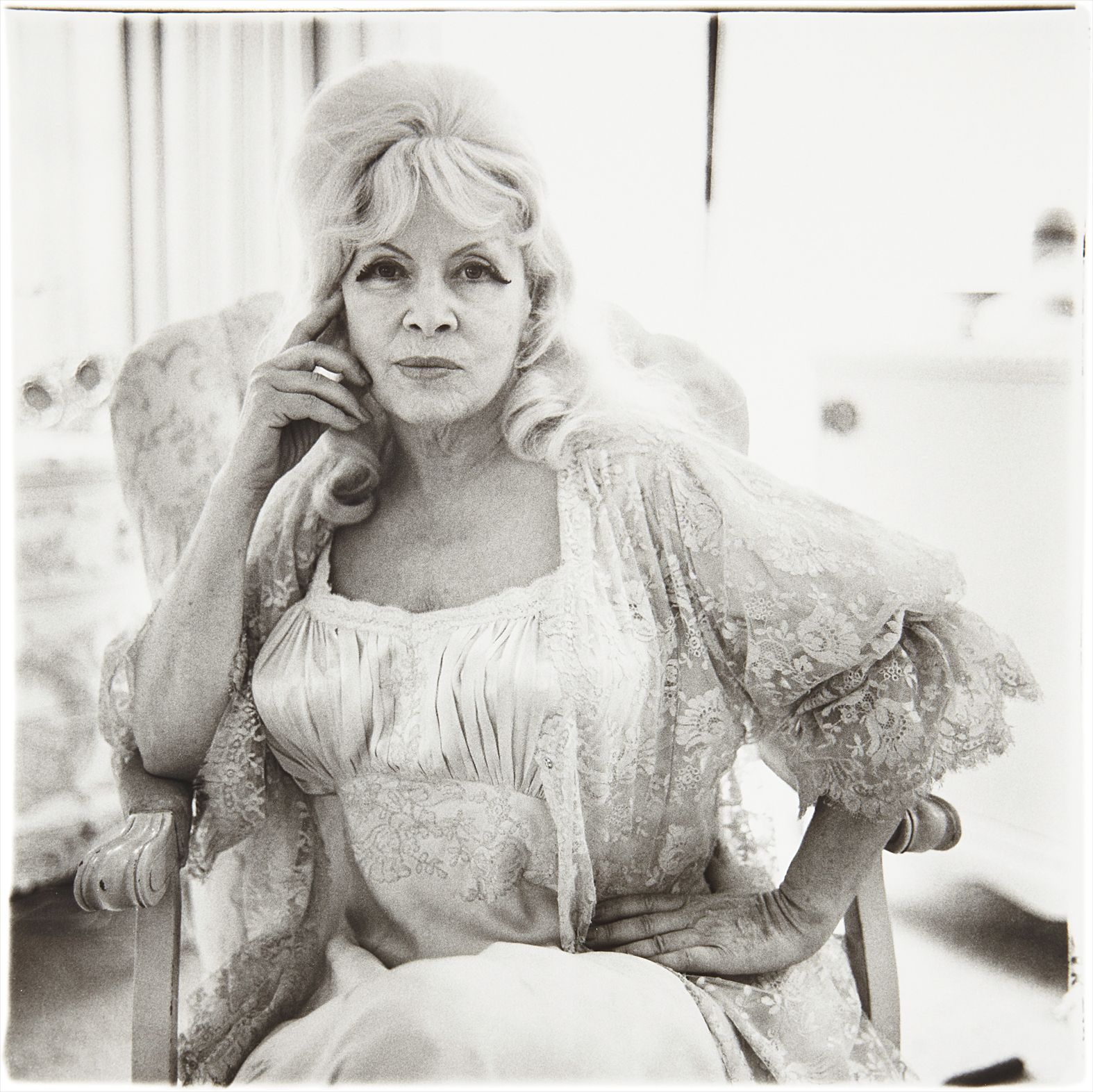 Diane Arbus — Mae West in a Chair at Home, Santa Monica, Cal.