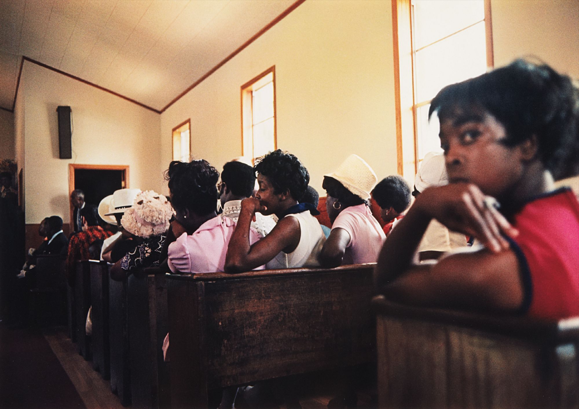 William Eggleston — Como, Mississippi (Black women in church)