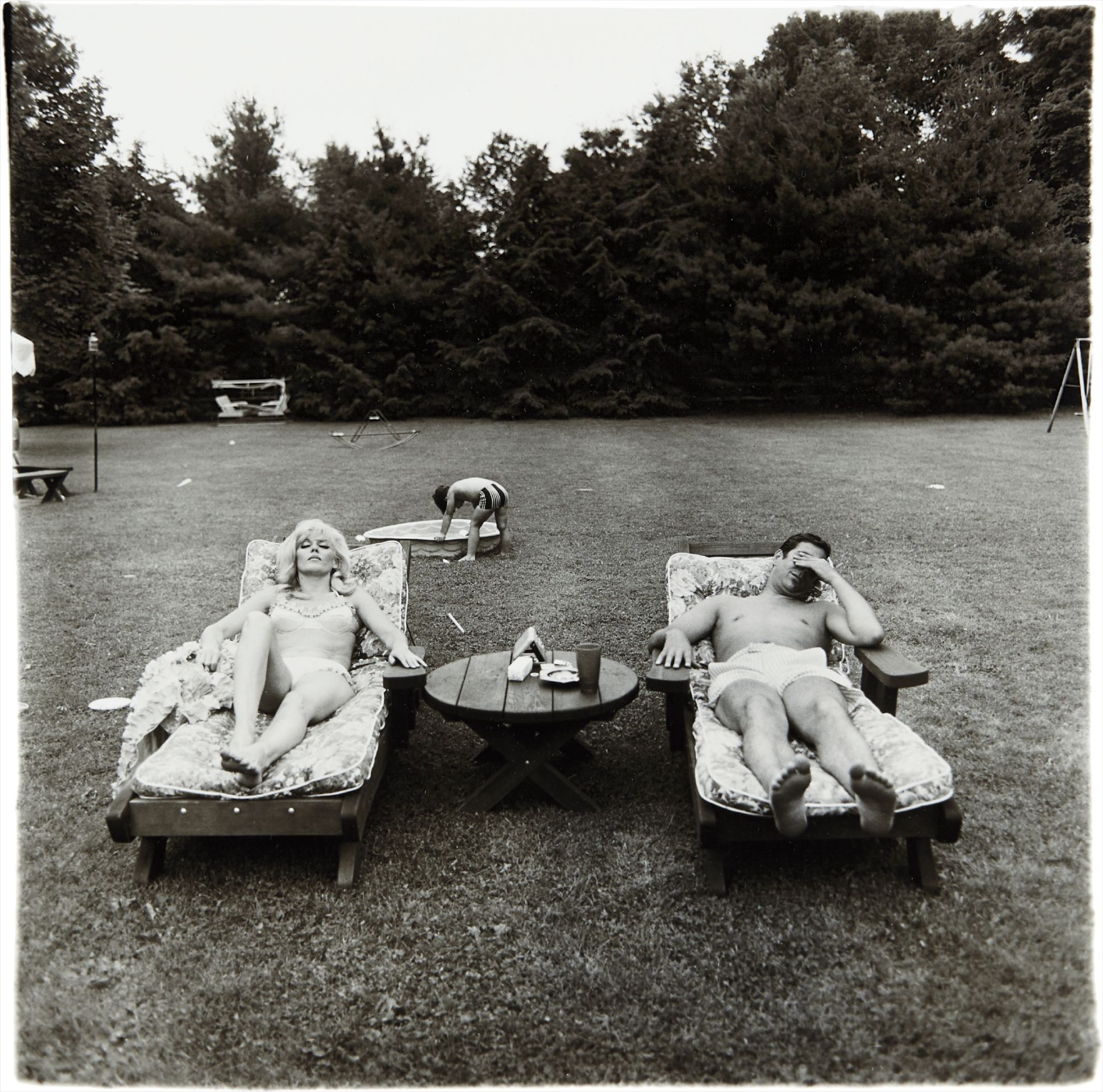 Diane Arbus — A family on their lawn one Sunday in Westchester, N.Y.