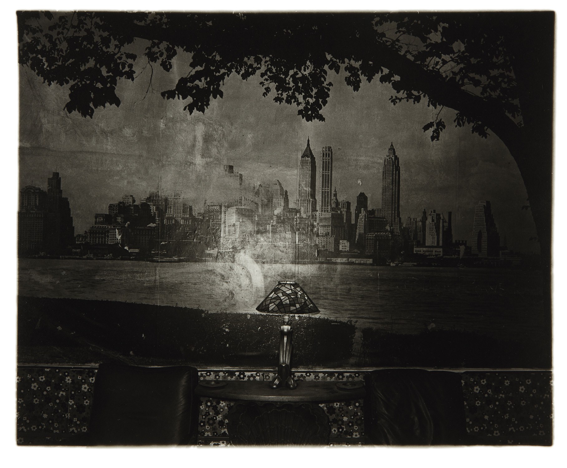 Diane Arbus — New York skyline in a lobby, NYC