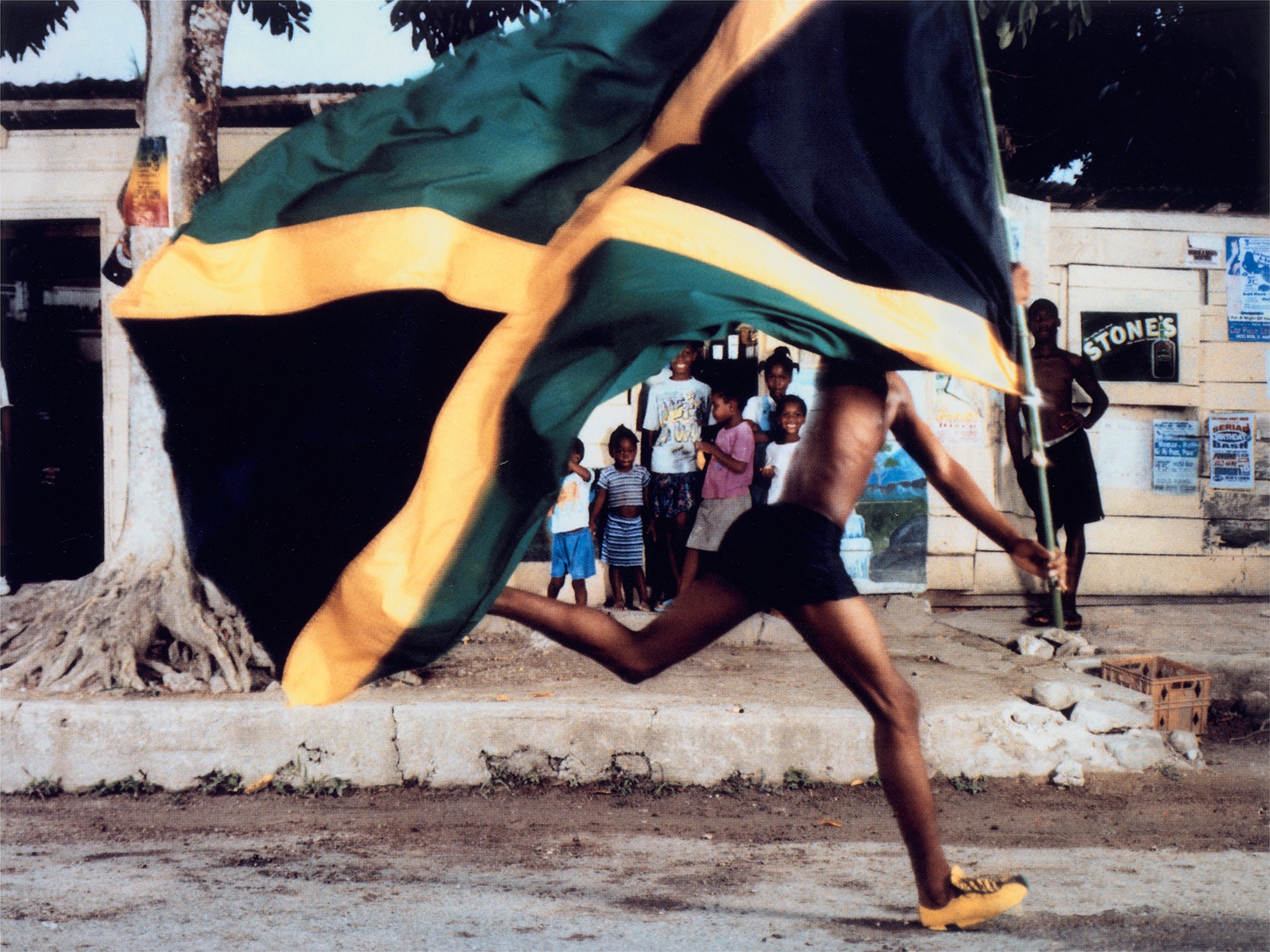 Hank Willis Thomas — An Unidentified Jamaican Boy Uses the Puma H Street Running Shoe to Run for His Freedom