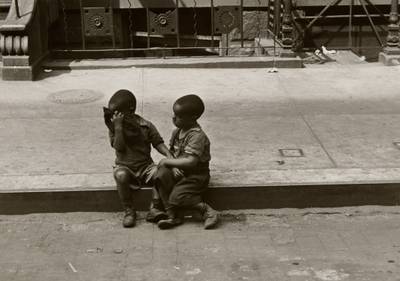 New York (two boys sitting)