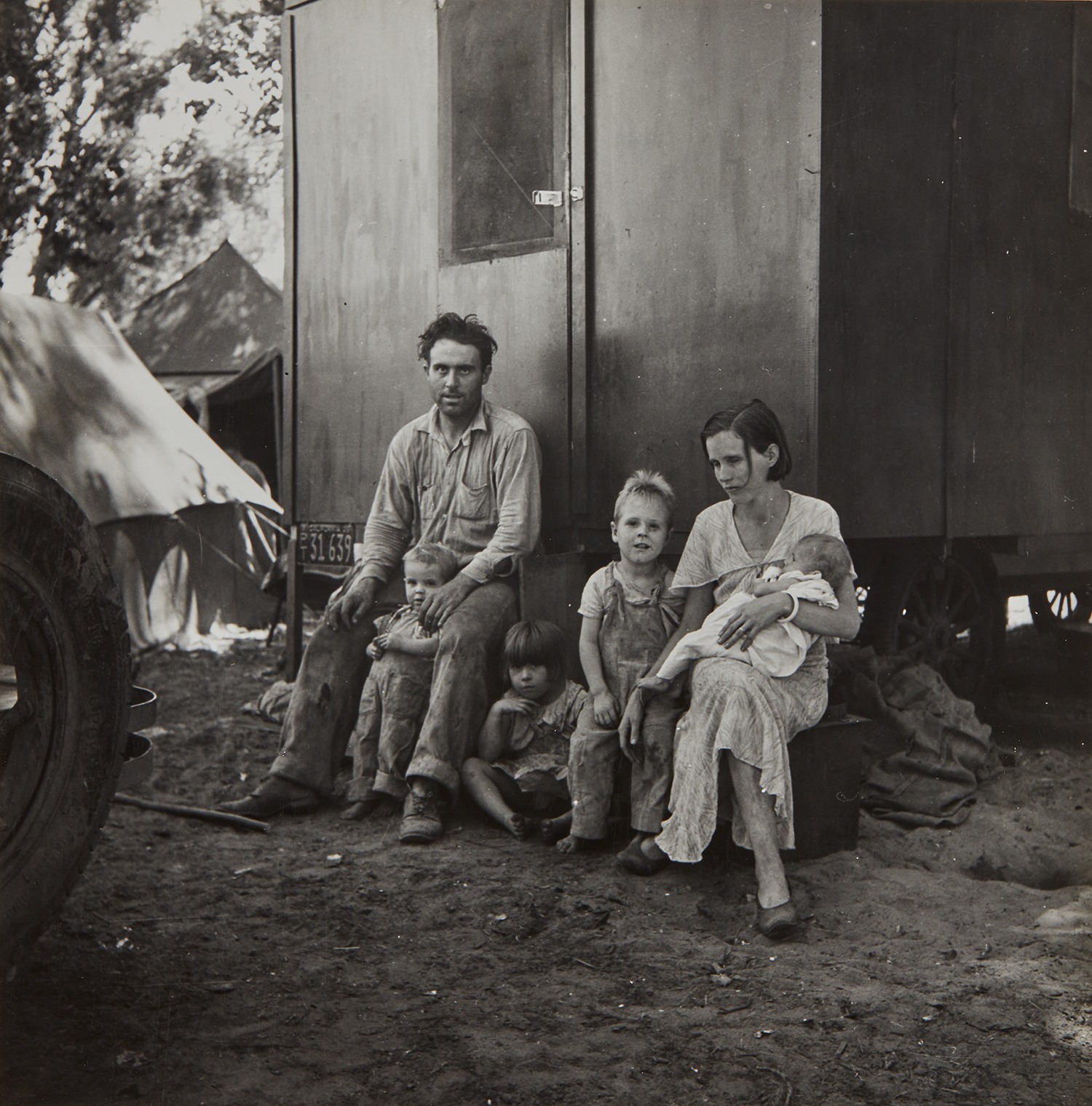A California fruit tramp and his family in the Marysville migrant camp