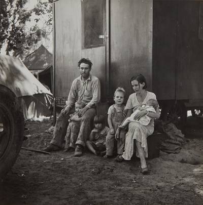 A California fruit tramp and his family in the Marysville migrant camp