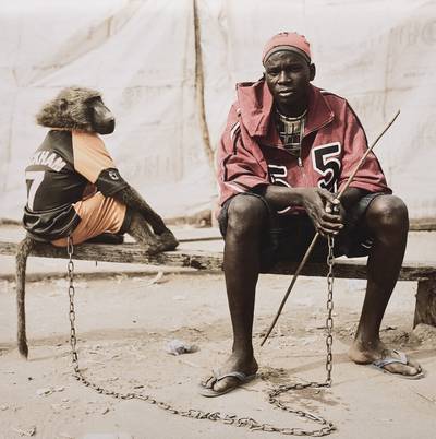 Abdulahi Galadima with the Monkey Amiloo, Nigeria from The Hyena and Other Men