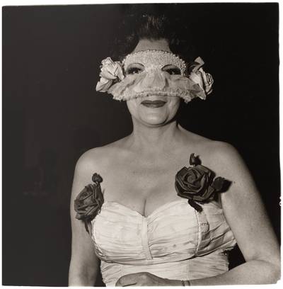 Lady at a Masked Ball with Two Roses in Her Dress, NYC