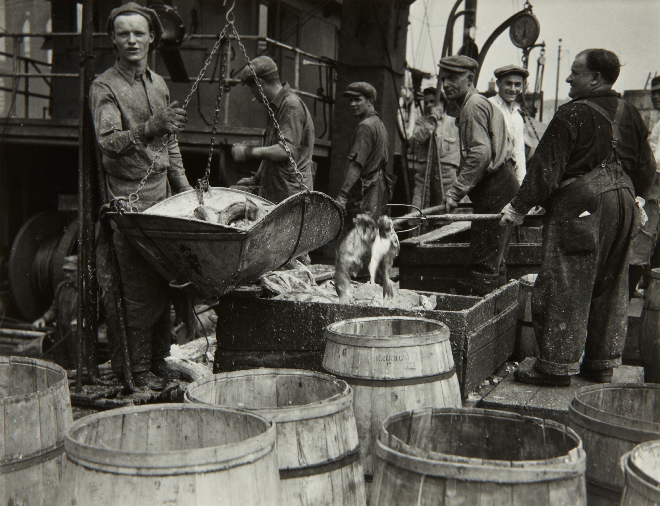 Berenice Abbott — Fishermen, Fulton Street Dock, New York