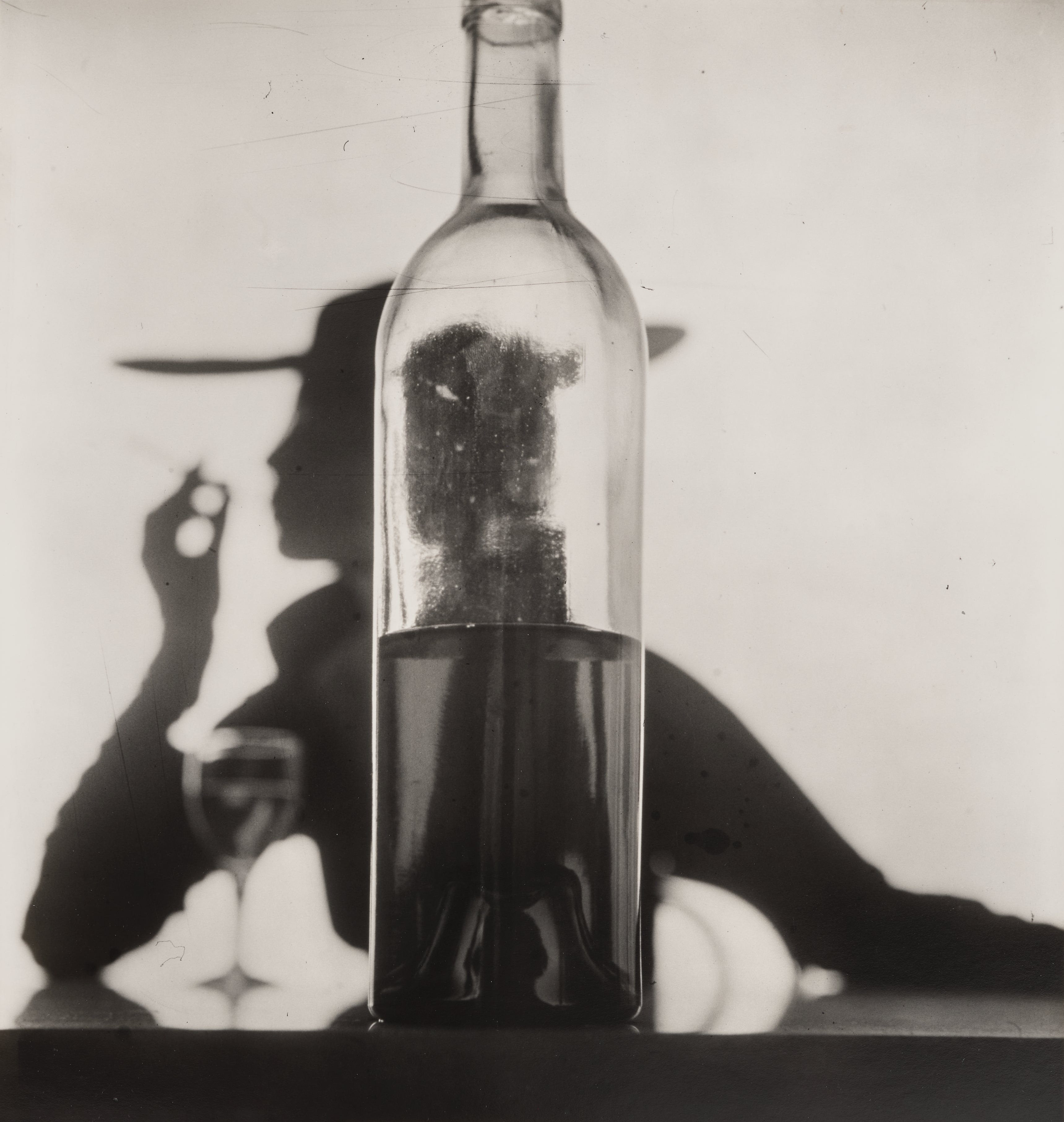 Irving Penn — Girl Behind Bottle (Jean Patchett), New York