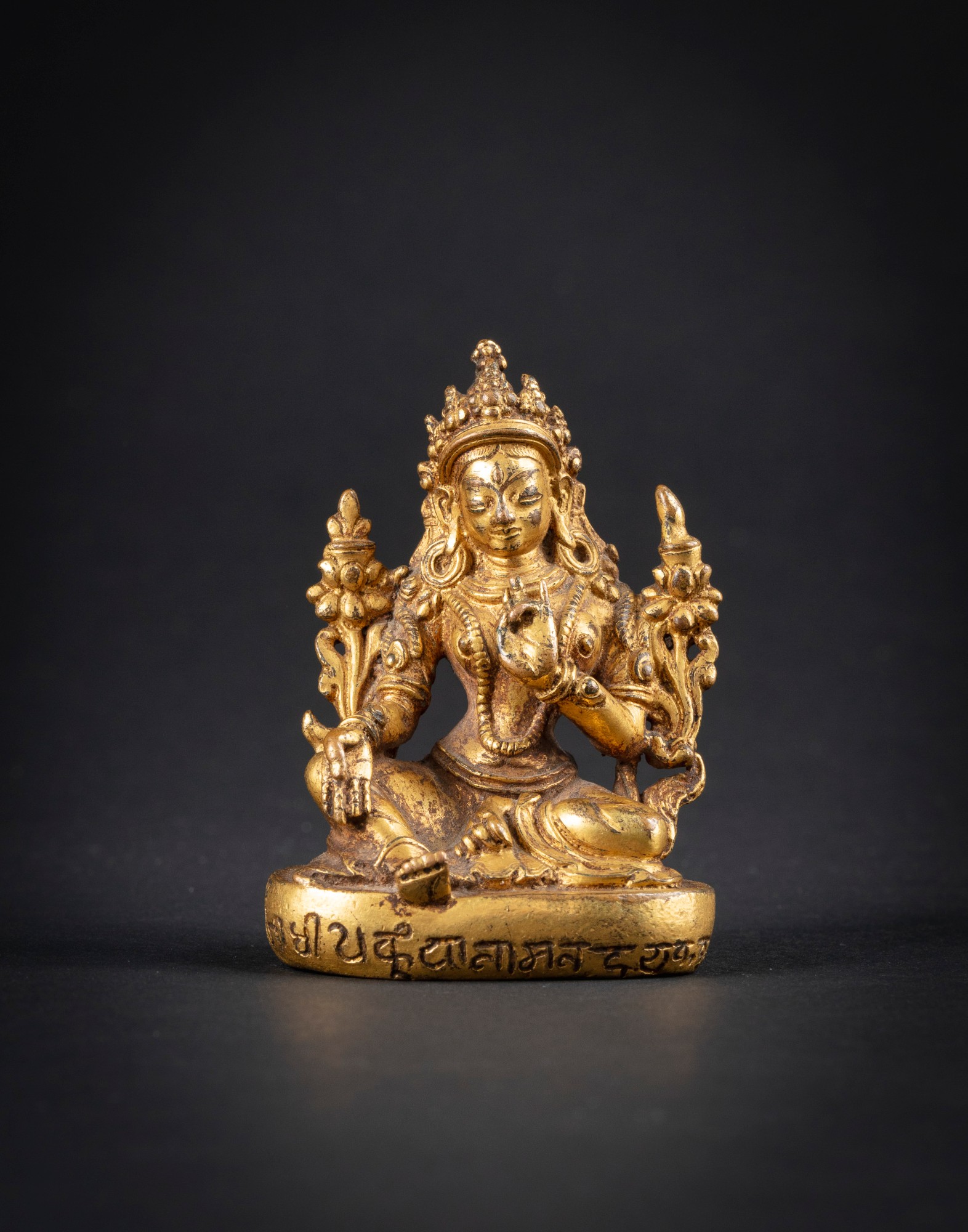 Unknown — A gilt copper alloy figure of Shyama Tara   Nepal, 19th century, dated 1858| 尼泊爾 十九世紀 鎏金銅合金綠度母坐像