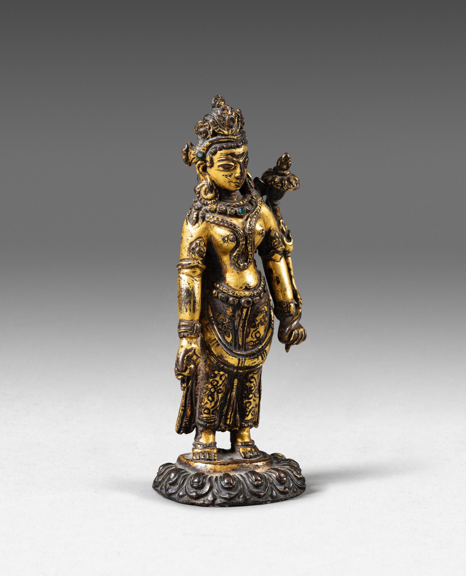 A gilt-copper alloy figure of Tara — 尼泊爾 約十五世紀 鎏金銅合金度母立像