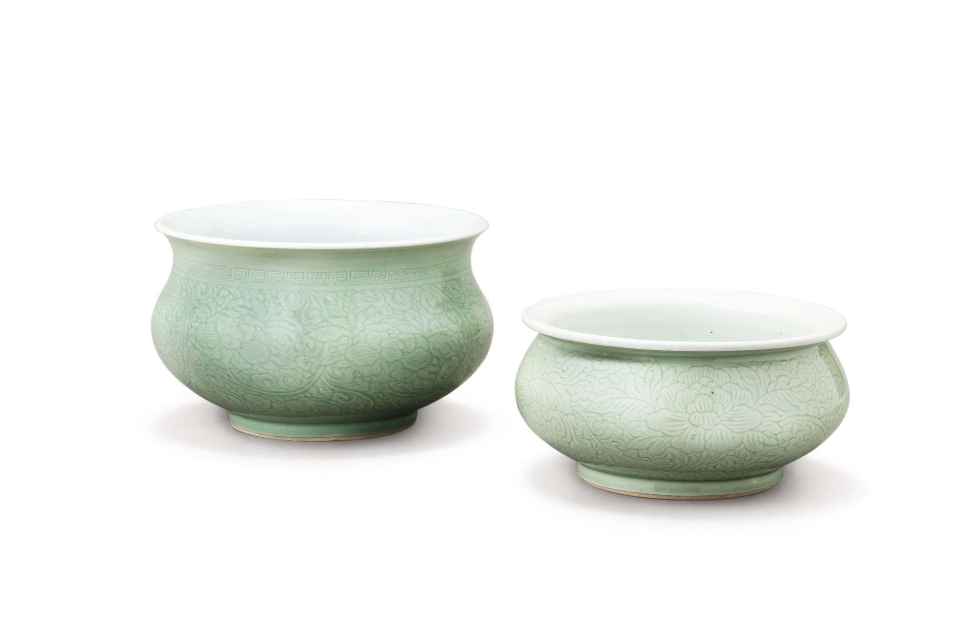 Two incised celadon-glazed 'peony' brush washers — 清康熙 青釉暗刻牡丹紋洗一組兩件