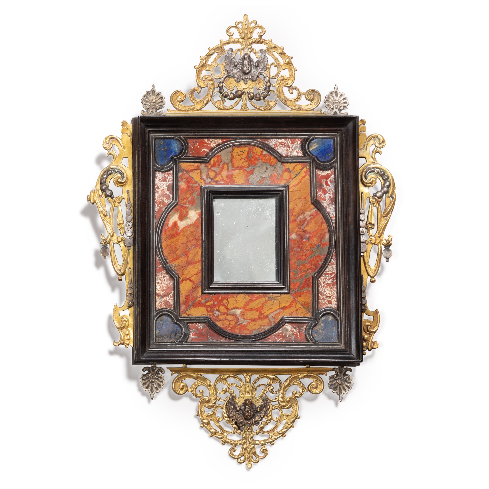 Italie, Florence, XVIIe siècle, Cadre en placage d'ébène et marqueterie de pierres dures formant miroir