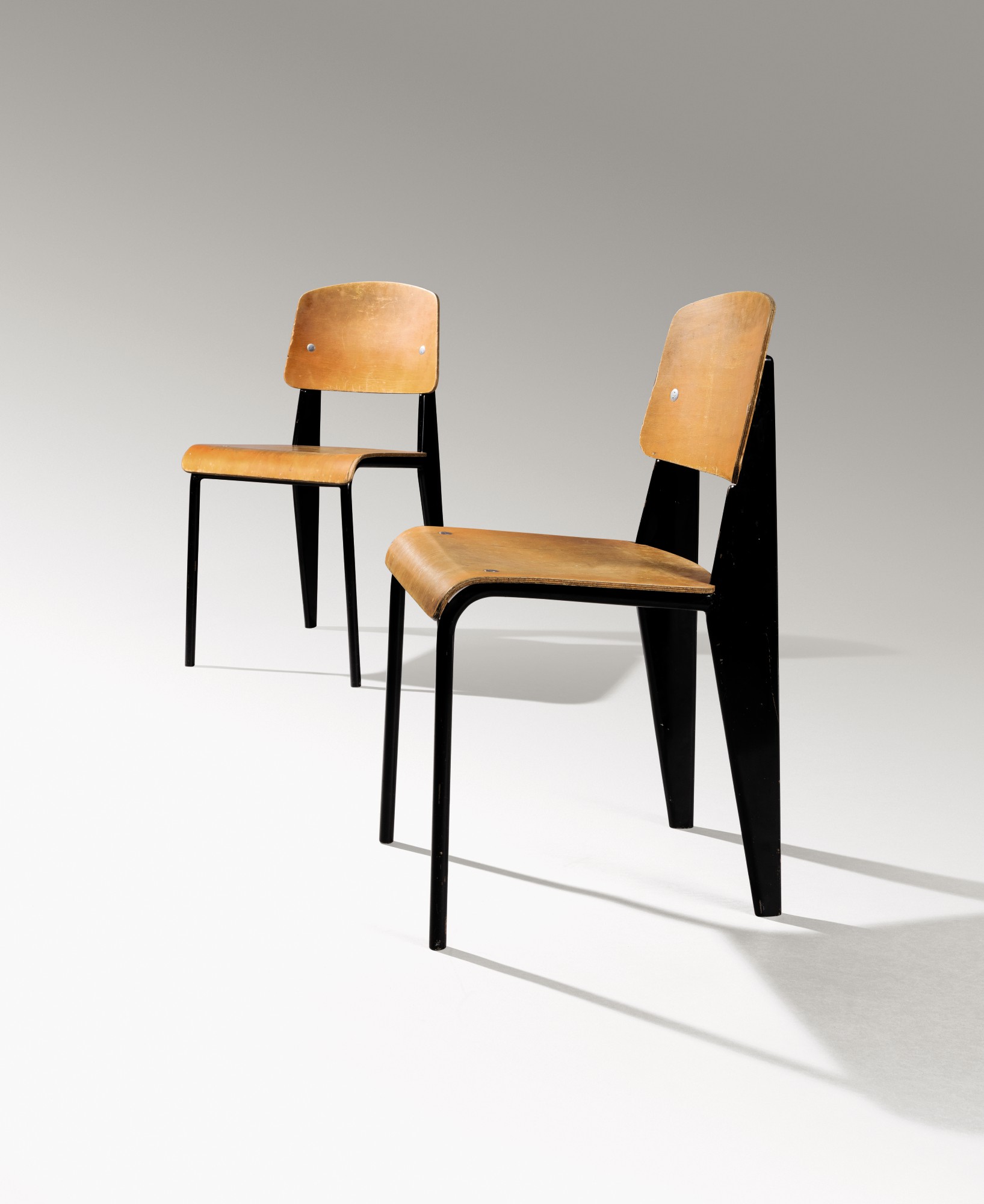 Jean Prouvé — Pair of Standard chairs, model no. 305, circa 1950