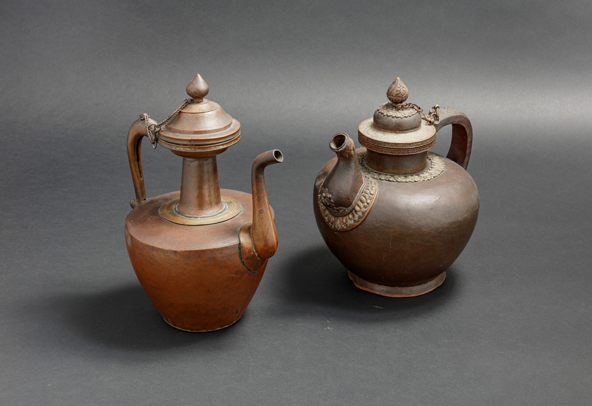 Two large copper Tibetan ritual ewers