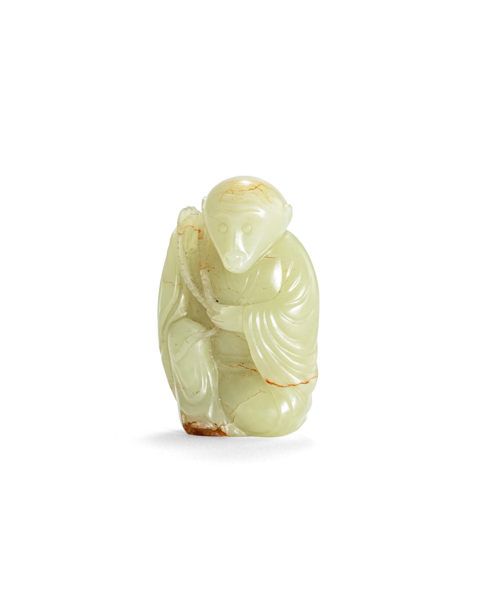 A yellow jade 'monkey' zodiac figure — 二十世紀 黃玉猴坐像