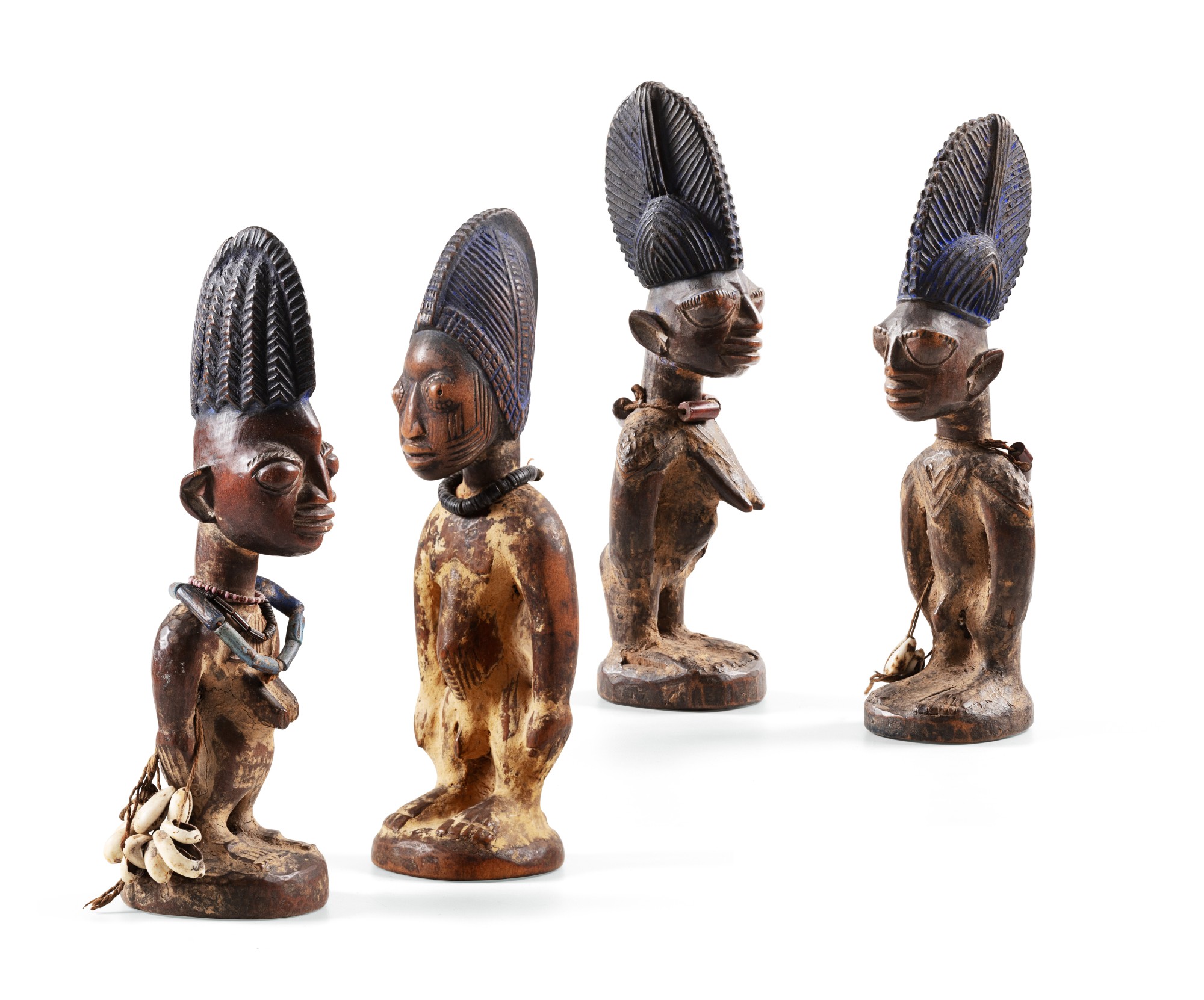 Quatre statuettes Ibeji, Yoruba, Nigeria — Four Yoruba Ibeji figures, Nigeria