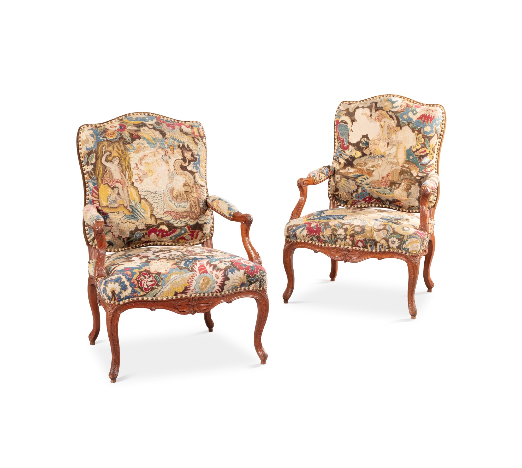 Unknown (Historical) — A pair of Louis XV carved beechwood fauteuils, mid 18th century Paire de fauteuils en hêtre sculpté d'époque Louis XV, milieu du XVIIIeme siècle