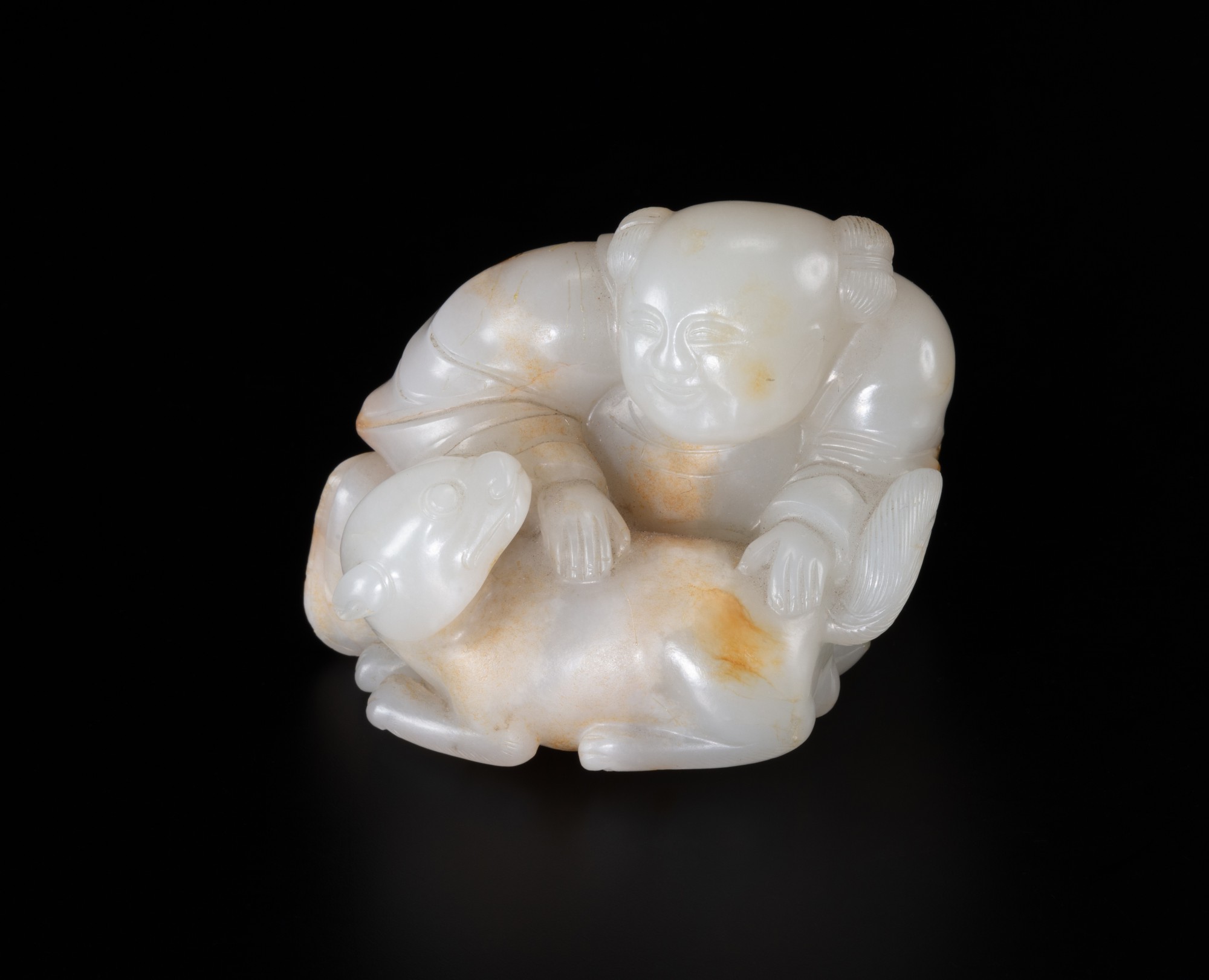 Unknown — 清十八世紀 白玉童子戲犬把件