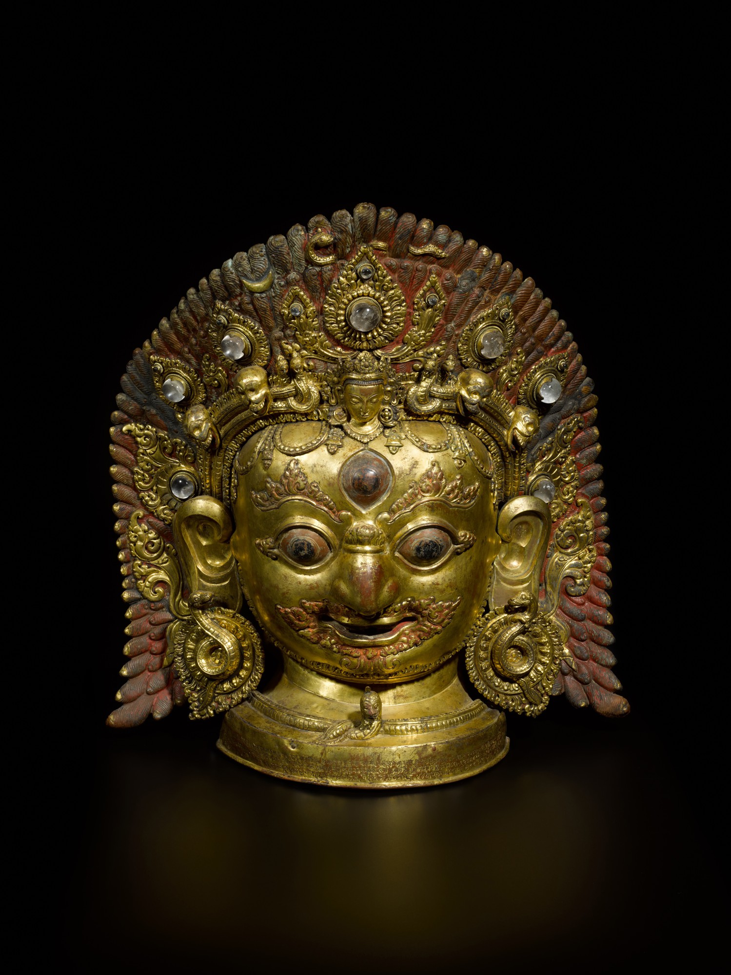 Nepal, 16th century, dated Nepal Samvat 719, equivalent to 1598 CE — 尼泊爾 鎏金銅嵌寶加彩陪臚面具 刻文：尼瓦歷719年，相當於西元1598 年