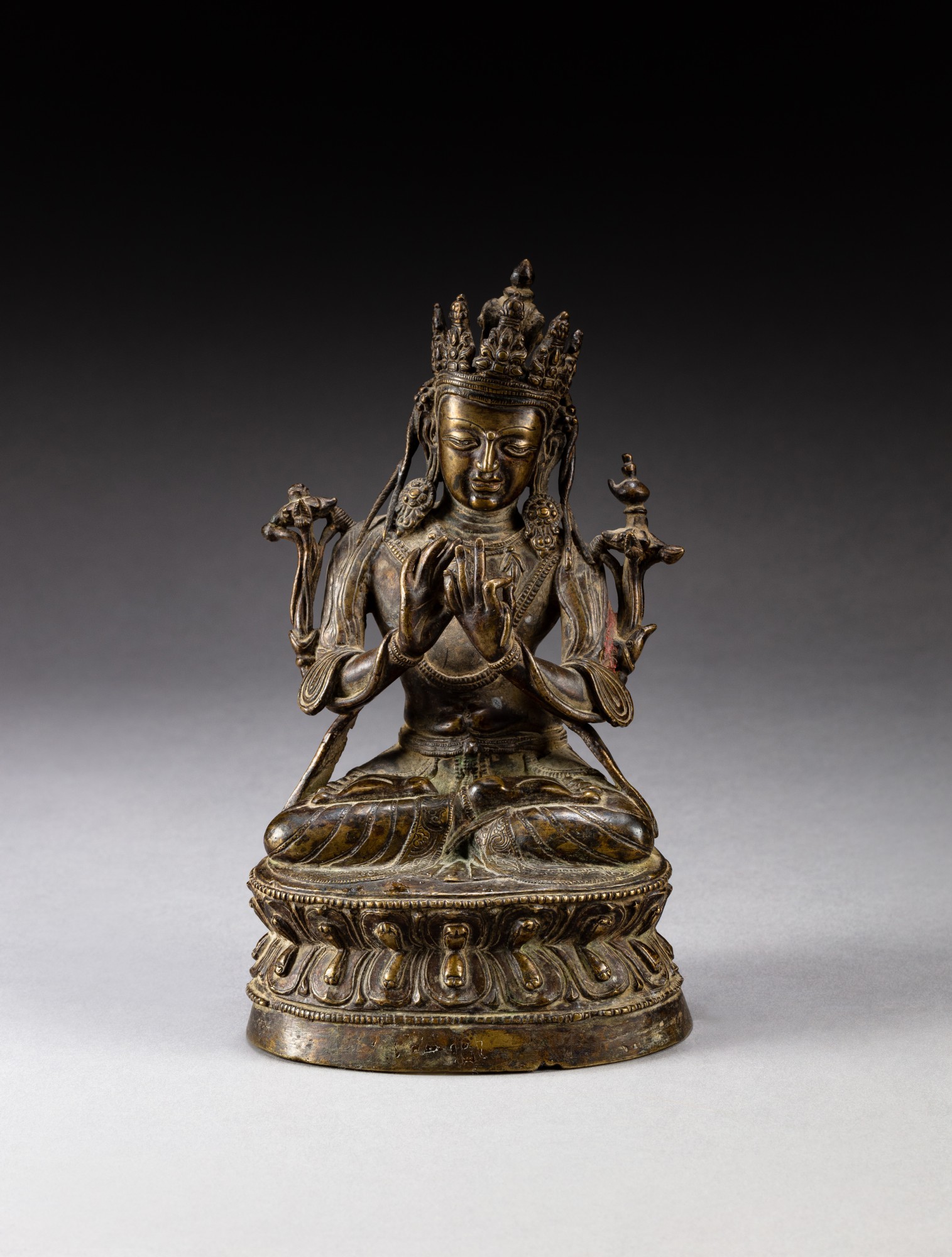 A bronze figure of Maitreya — 西藏 十六世紀 銅彌勒佛坐像