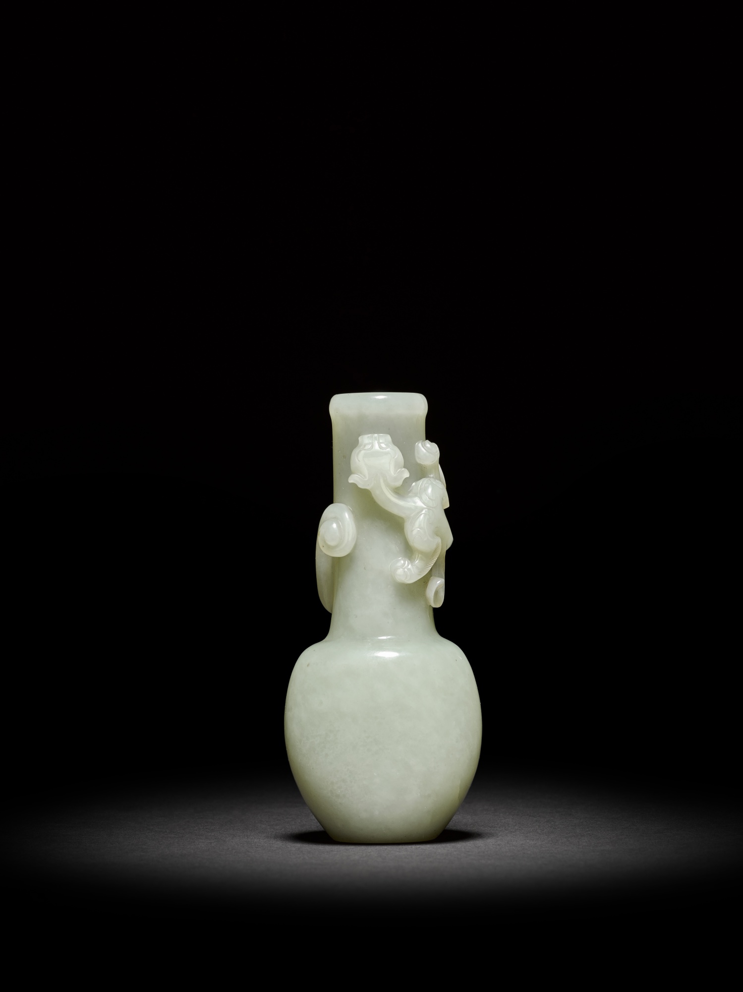 A small pale celadon jade 'dragon' vase — 清十八世紀 青白玉雕龍紋瓶