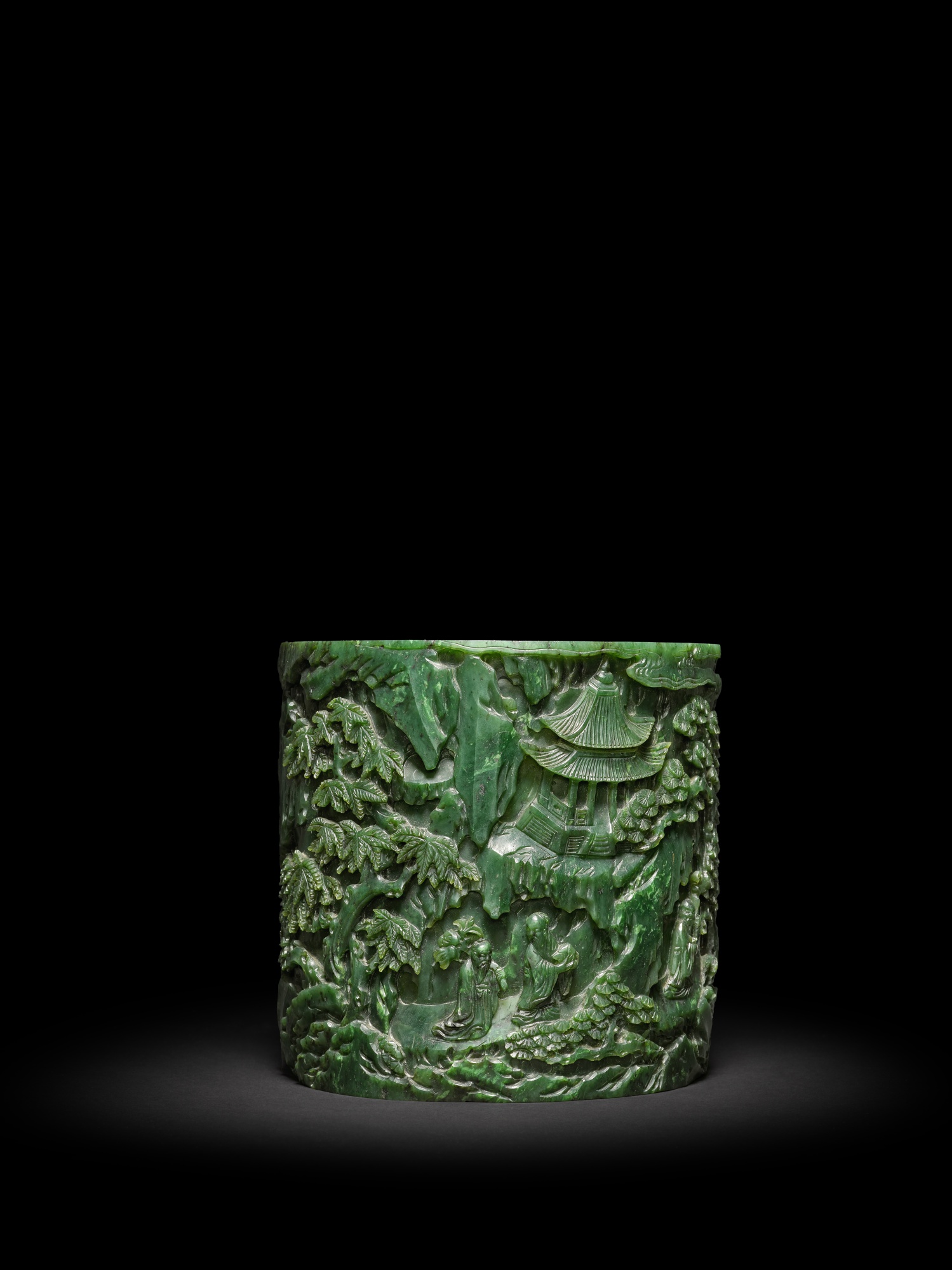 A spinach-green jade 'landscape' brushpot — 清乾隆 碧玉雕福祿壽三星圖筆筒