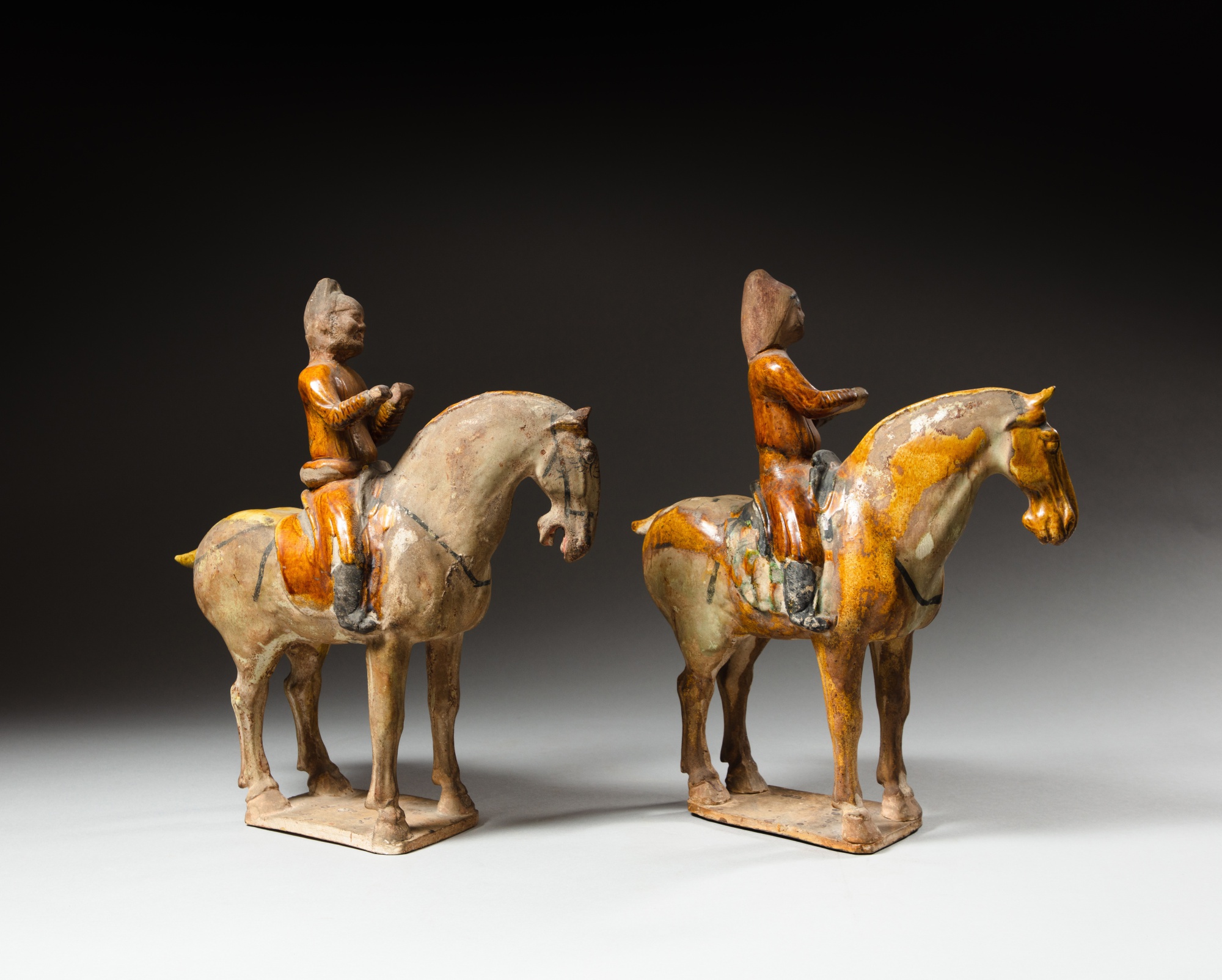 Two sancai-glazed equestrian figures