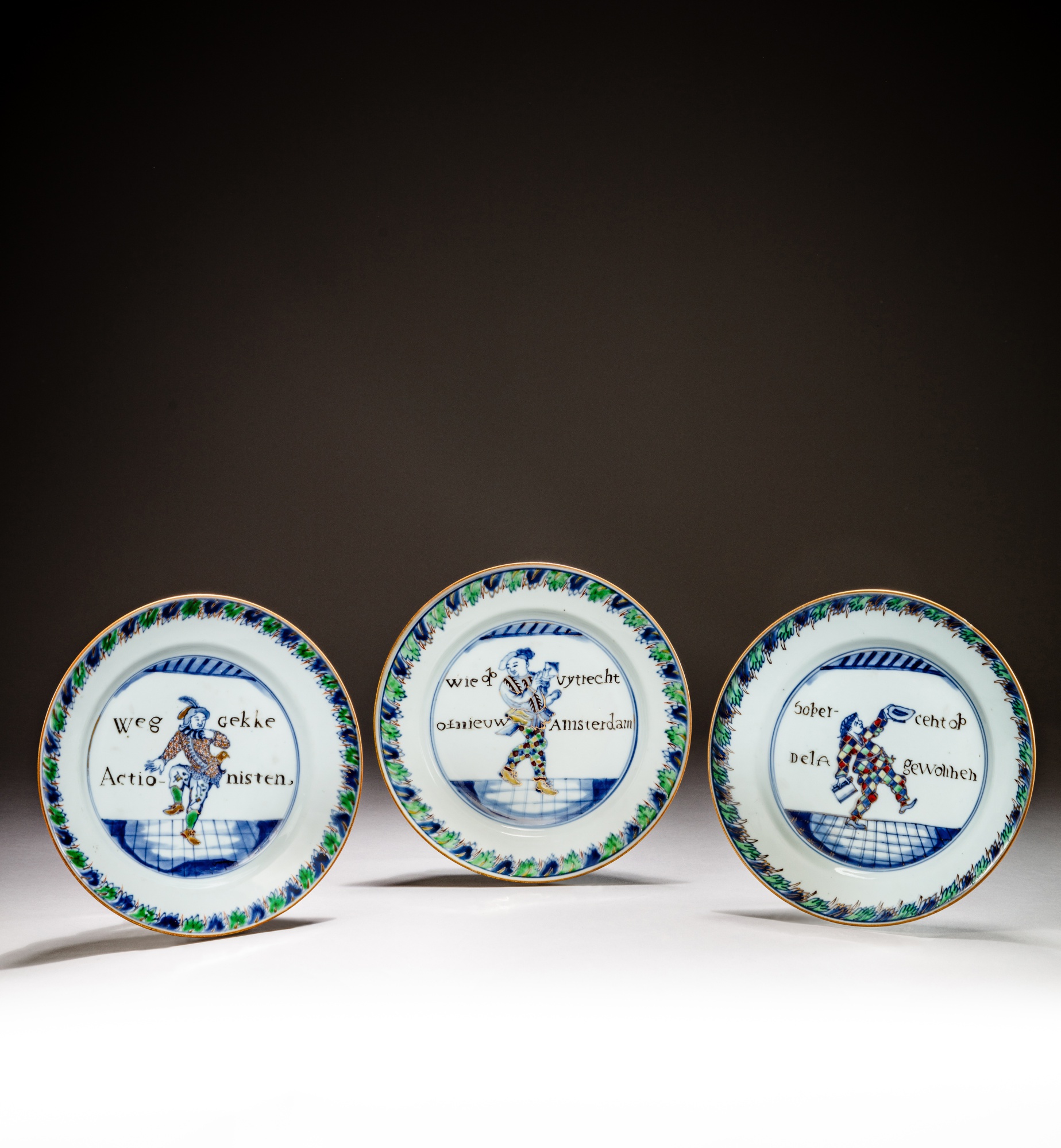 Three rare gilt-decorated doucai 'figural' dishes — 清康熙 鬪彩描金人物圖盤一組三件