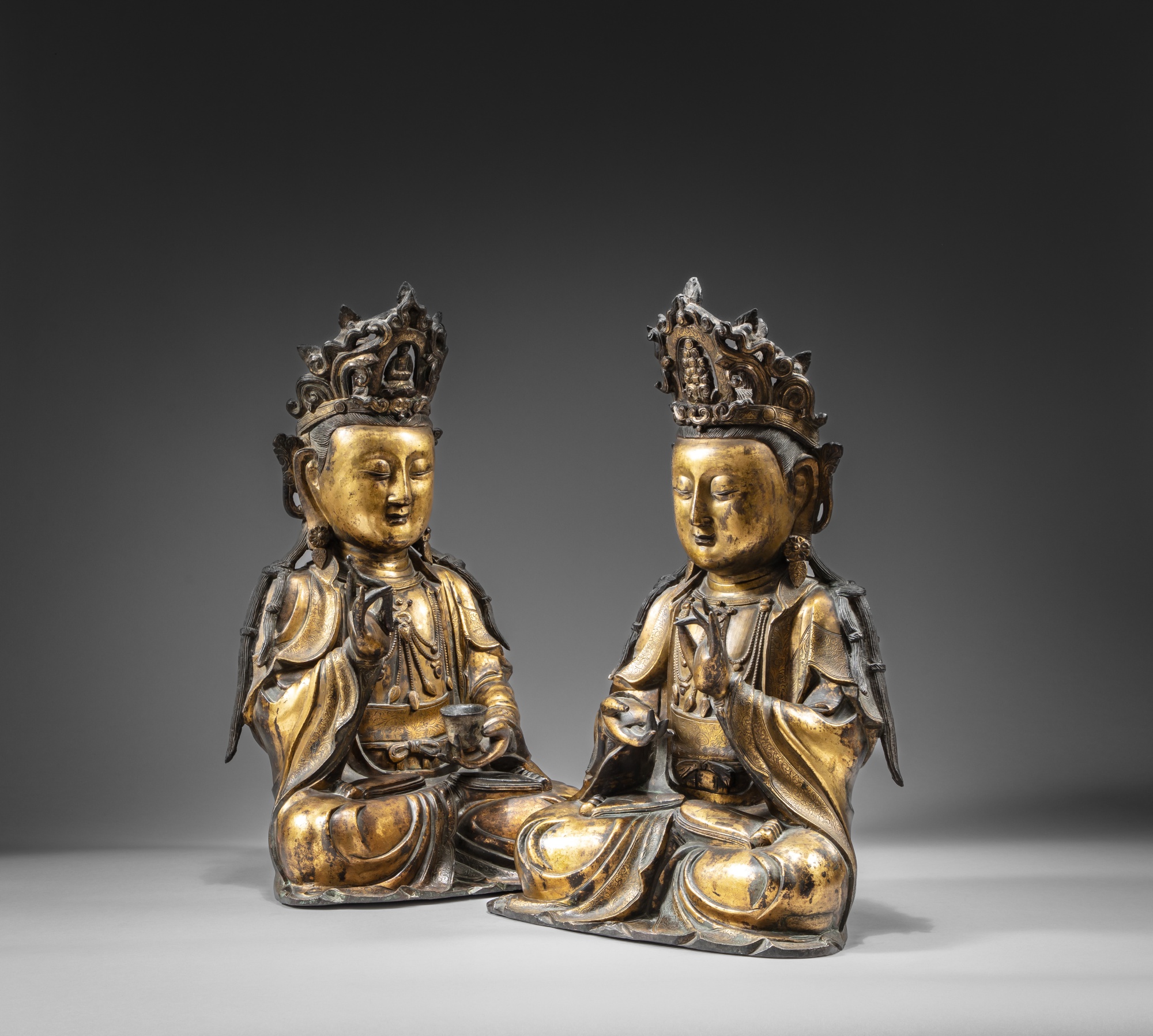 Two large companion gilt-bronze figures of Bodhisattvas — 明十六至十七世紀 鎏金銅菩薩坐像一組兩尊