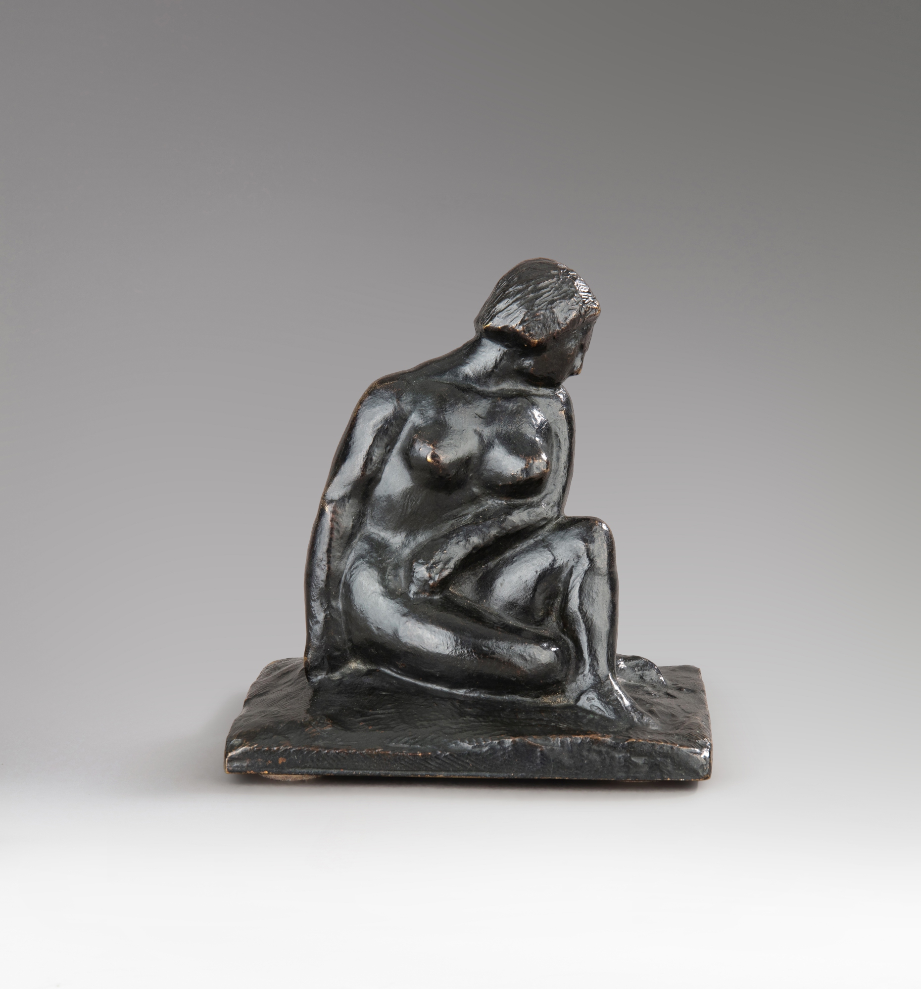 Georges Guyot — Woman sitting on the ground