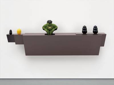 plastic laminated wood shelf, small rubber dog chew, plastic lemon/lime saver, polystone 'Hulk' bust, 2 large rubber dog chews