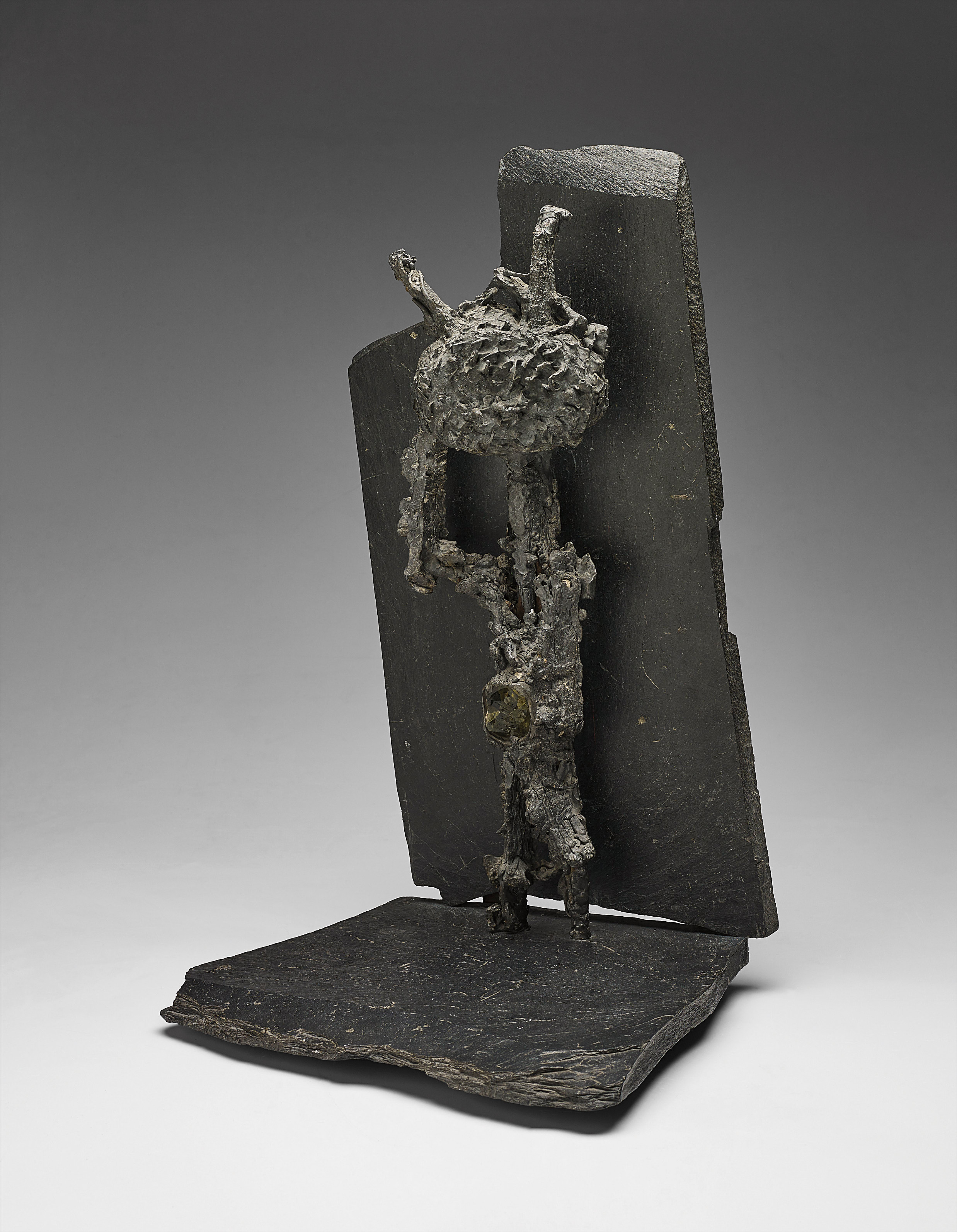 lead and coloured glass, mounted on slate