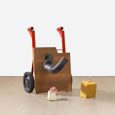 metal, wood, silicon, yoghurt cup, plastic bandage cover and foam, in 3 parts