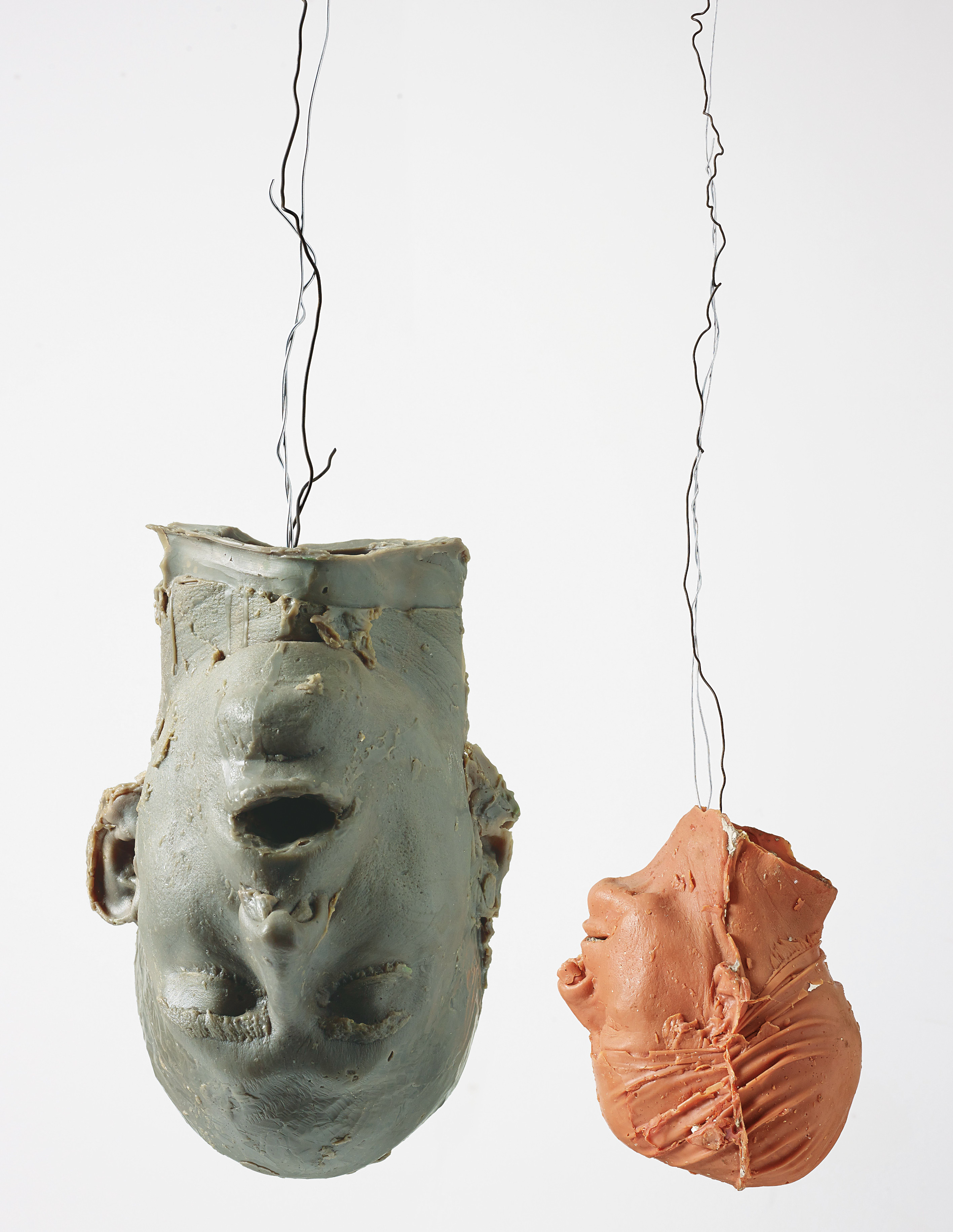 Bruce Nauman — Hanging Heads # 1 (Blue Andrew, Mouth Open / Red Julie with Cap)
