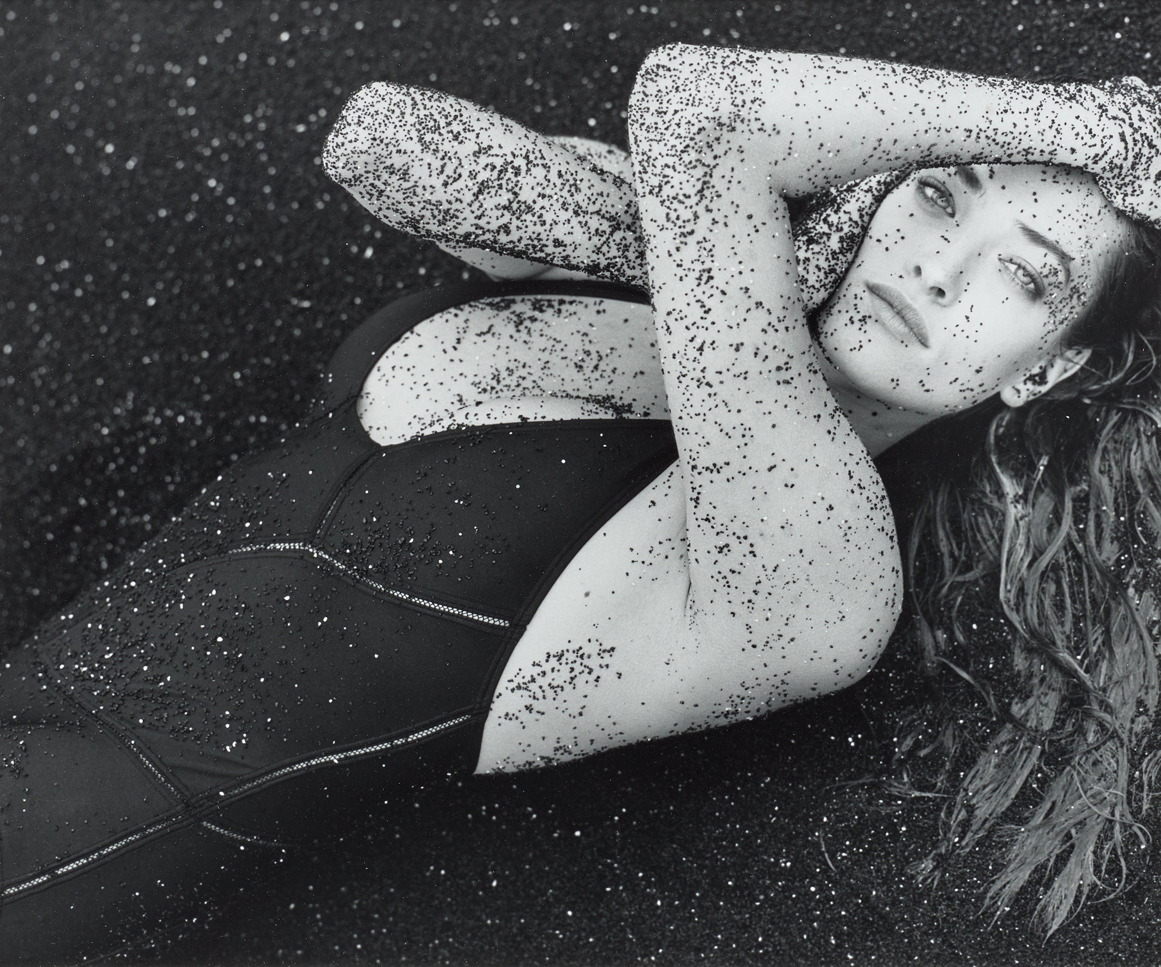 Herb Ritts — Tatjana with Black Sand, Hawaii, 1987