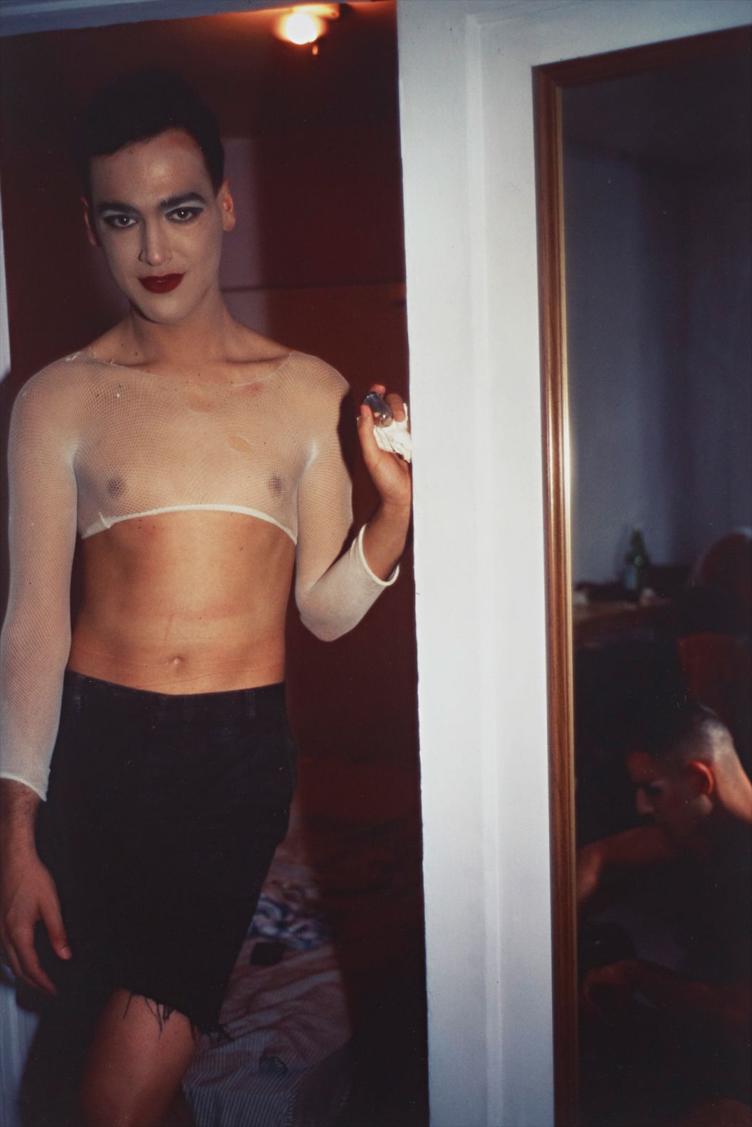 Nan Goldin — Jimmy Paulette undressing with w. Tabboo