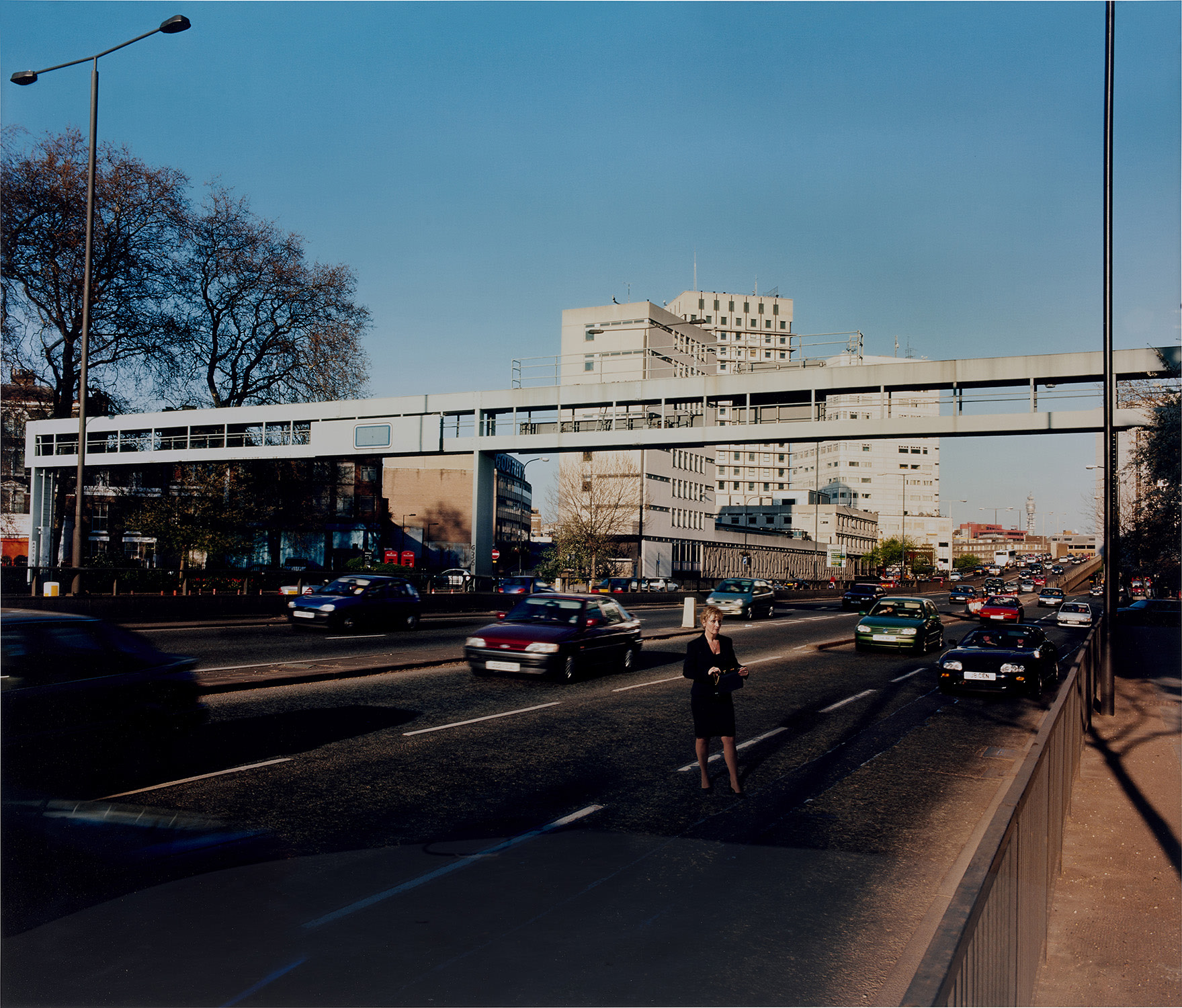 Mitra Tabrizian — From the Series: Lost Times “Women Crossing Highway”