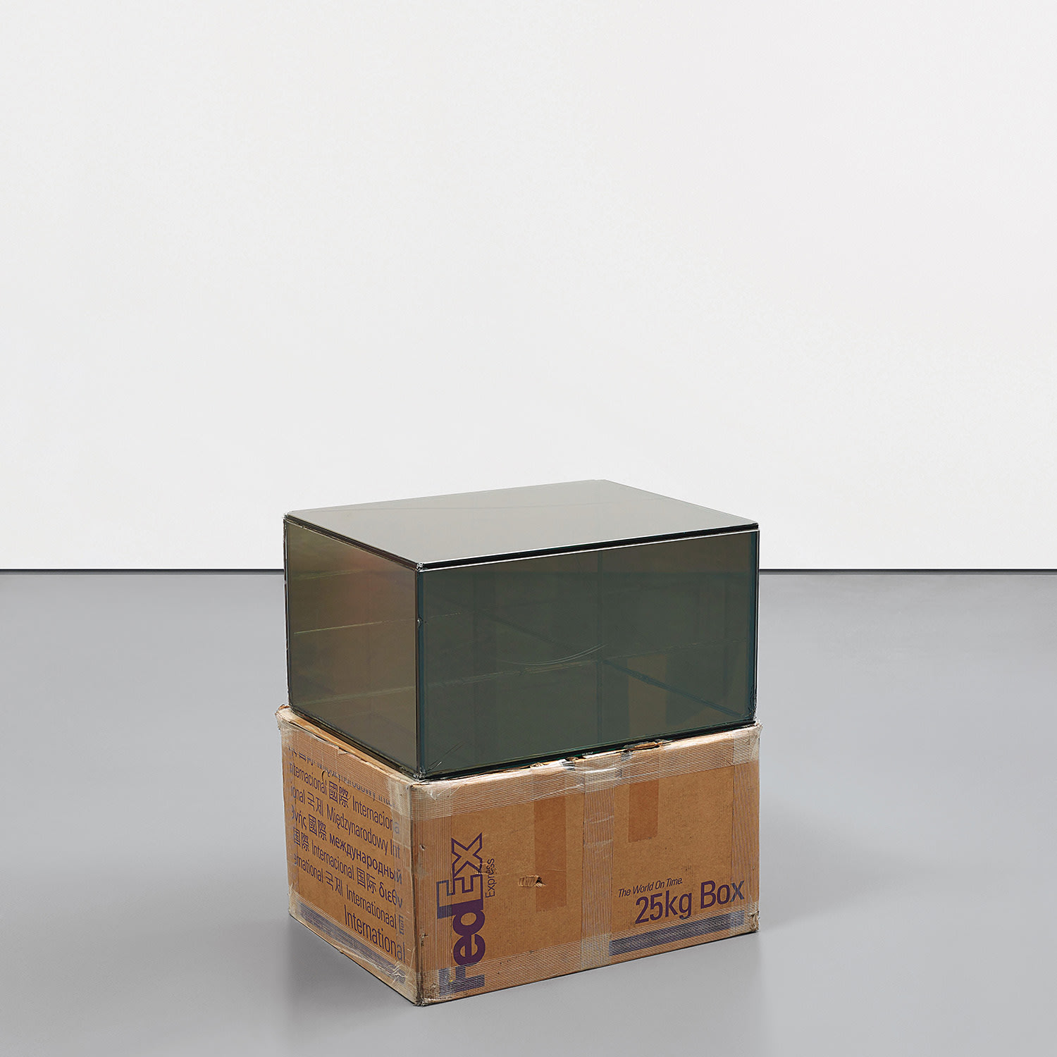 Walead Beshty — laminated Mirropane, FedEx shipping box, accrued FedEx shipping and tracking labels