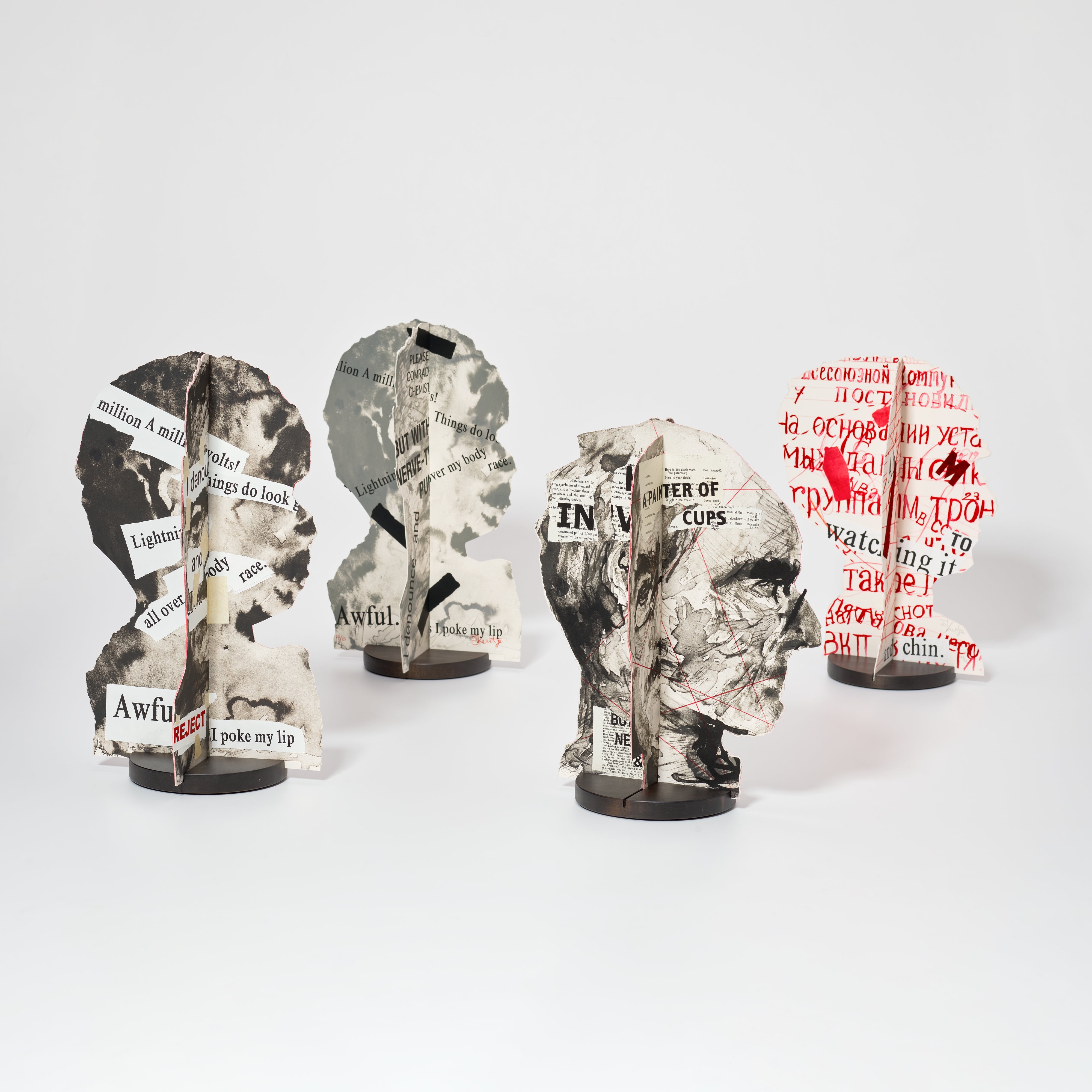 Four Paper Heads