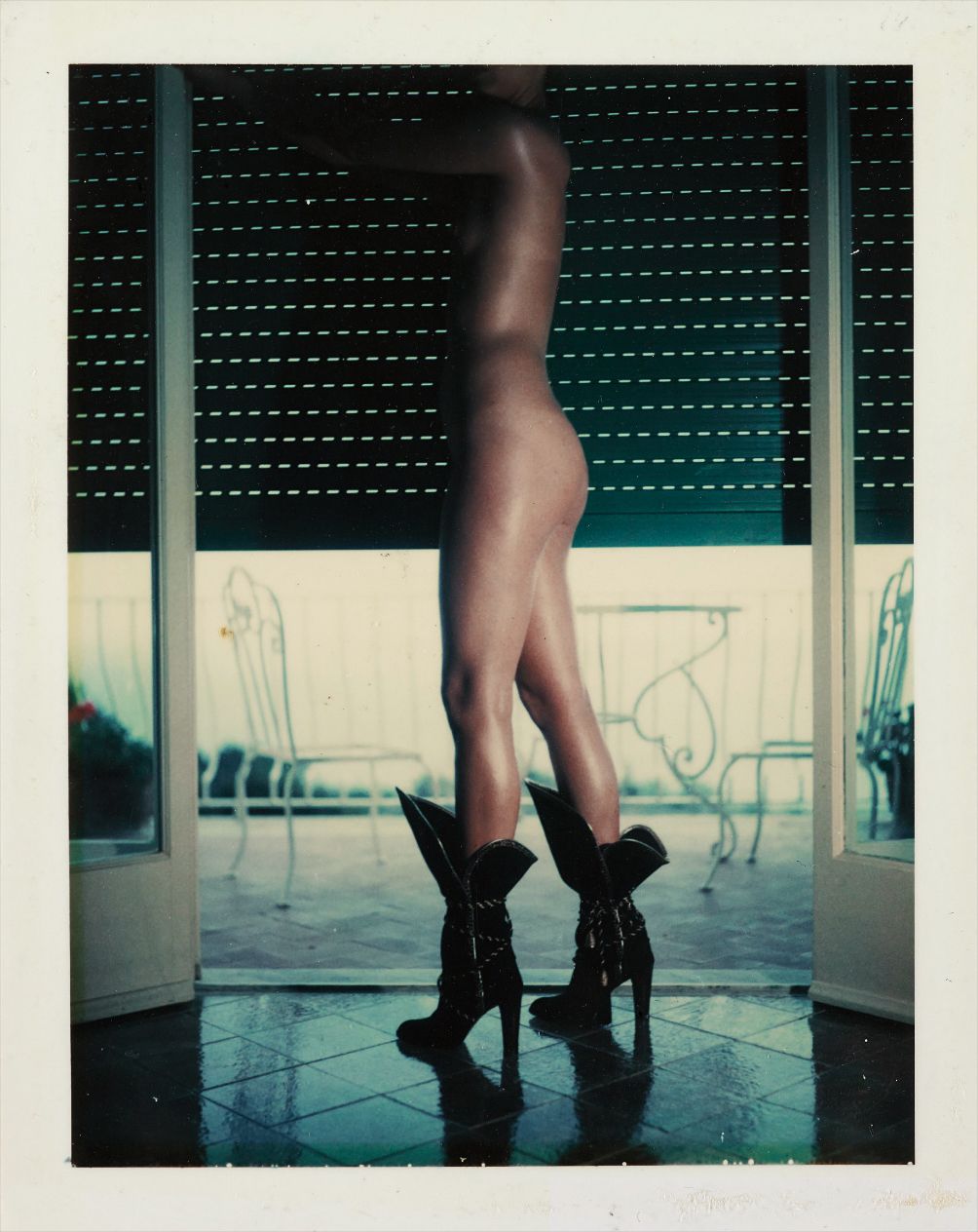 Helmut Newton — Yves Saint Laurent boots, Vogue Italia, Capri