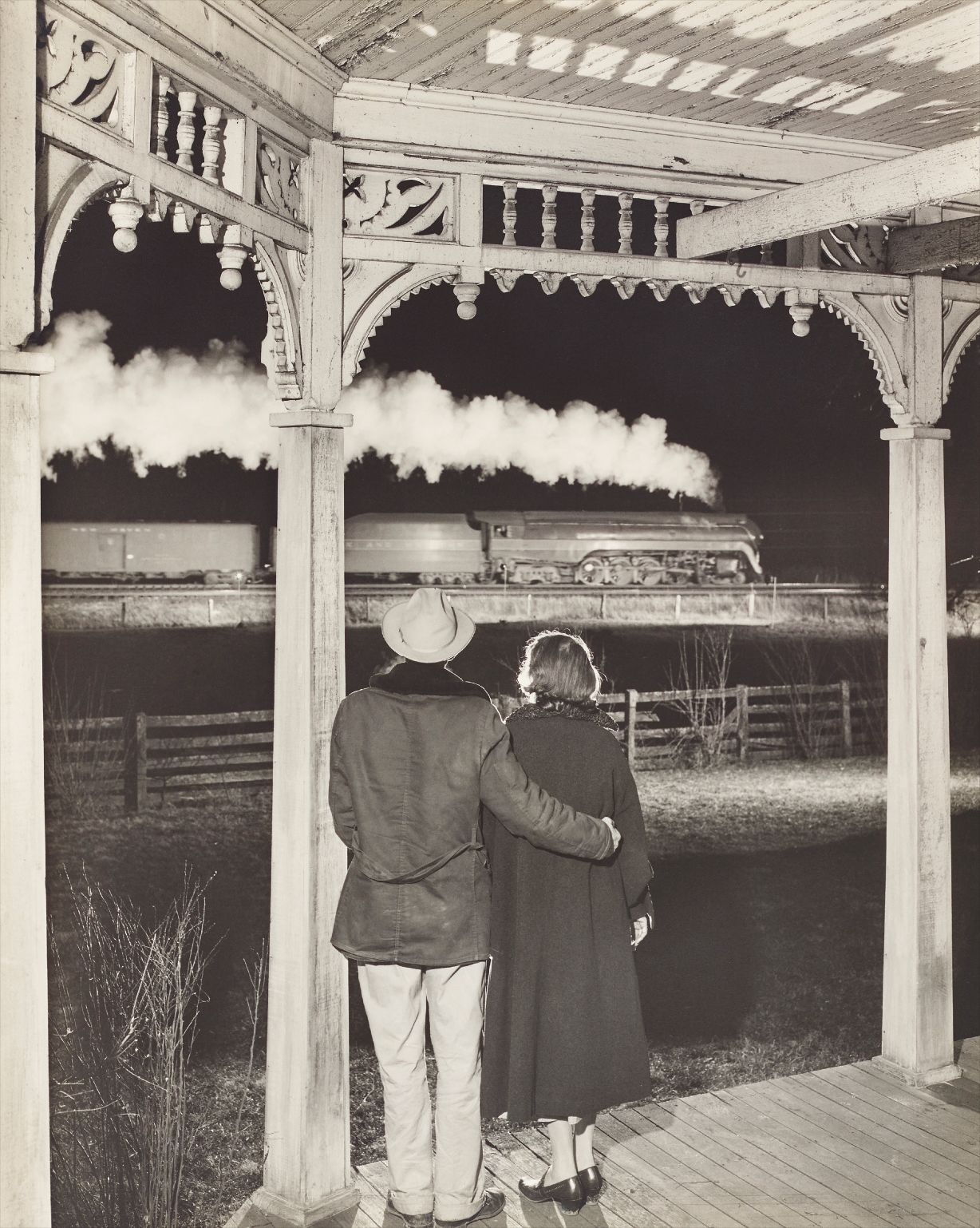 Mr. and Mrs. Pope watch the last steam powered passenger train, Max Meadows, Virginia