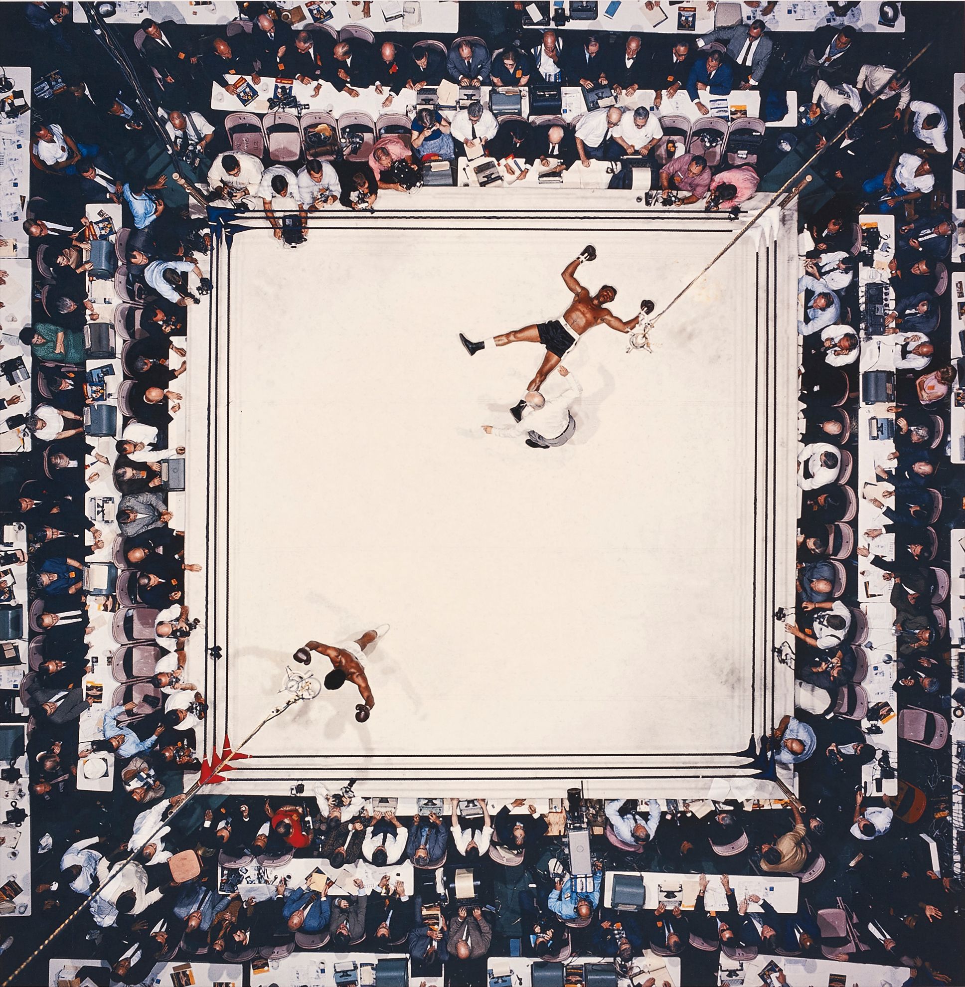 Neil Leifer — Aerial of Muhammad Ali victorious after his round two knockdown of Cleveland Williams during the 1966 World Heavyweight Title fight at the Astrodome, Houston, Texas, November 14