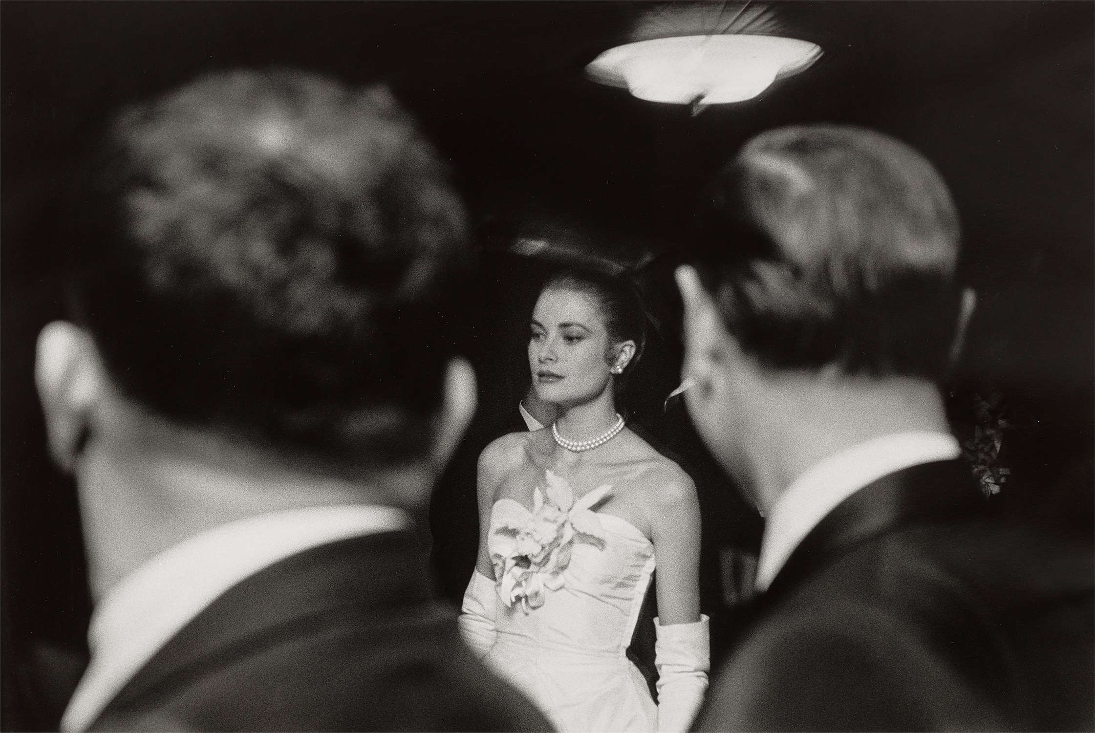 Elliott Erwitt — The Engagement Party of Grace Kelly and Prince Rainier of Monaco at the Waldorf-Astoria Hotel, New York