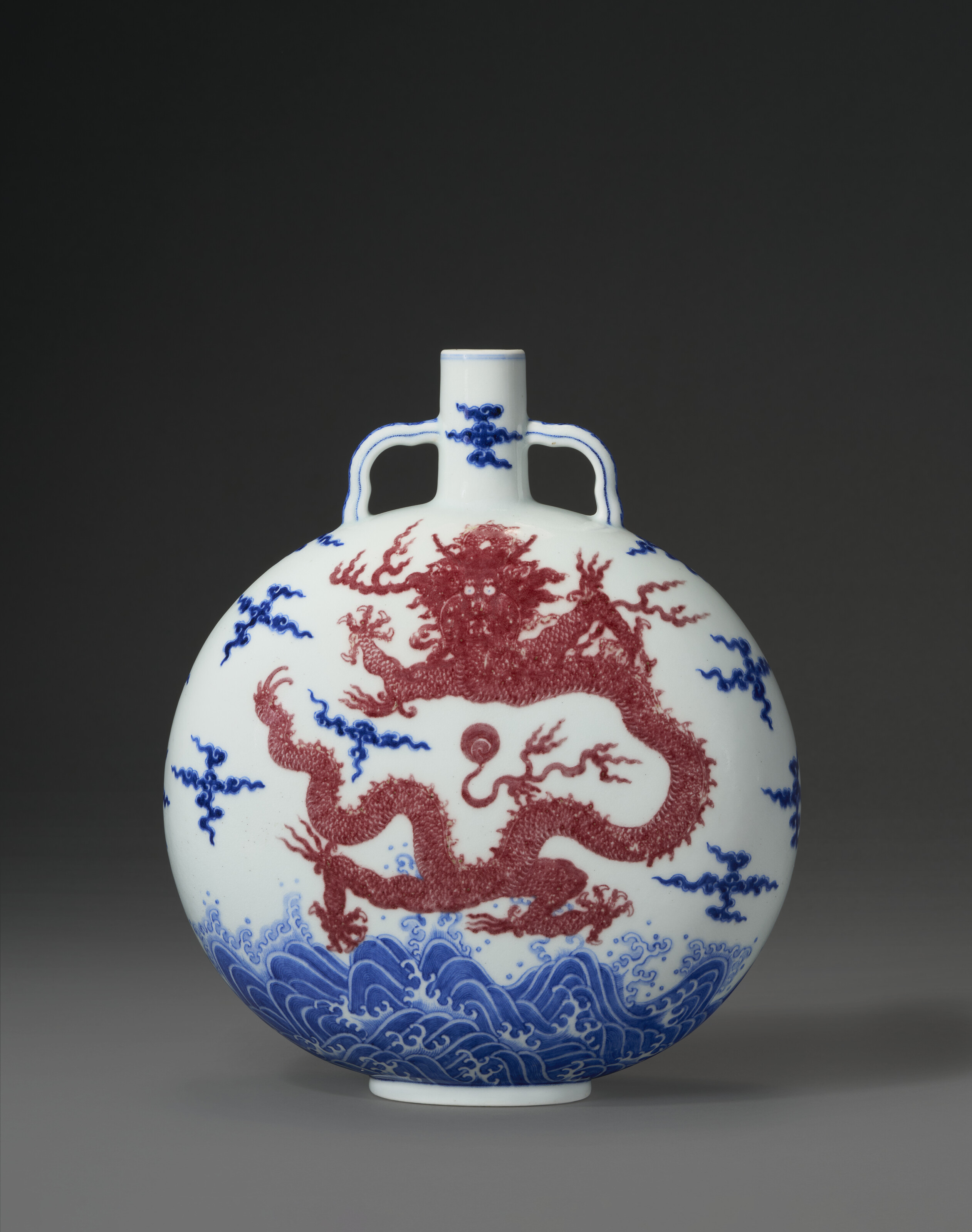 A Superb Underglaze-blue And Copper-red-decorated 'dragon' Moon Flask — QIANLONG SEAL MARK IN UNDERGLAZE BLUE AND OF THE PERIOD (1736-1795)
