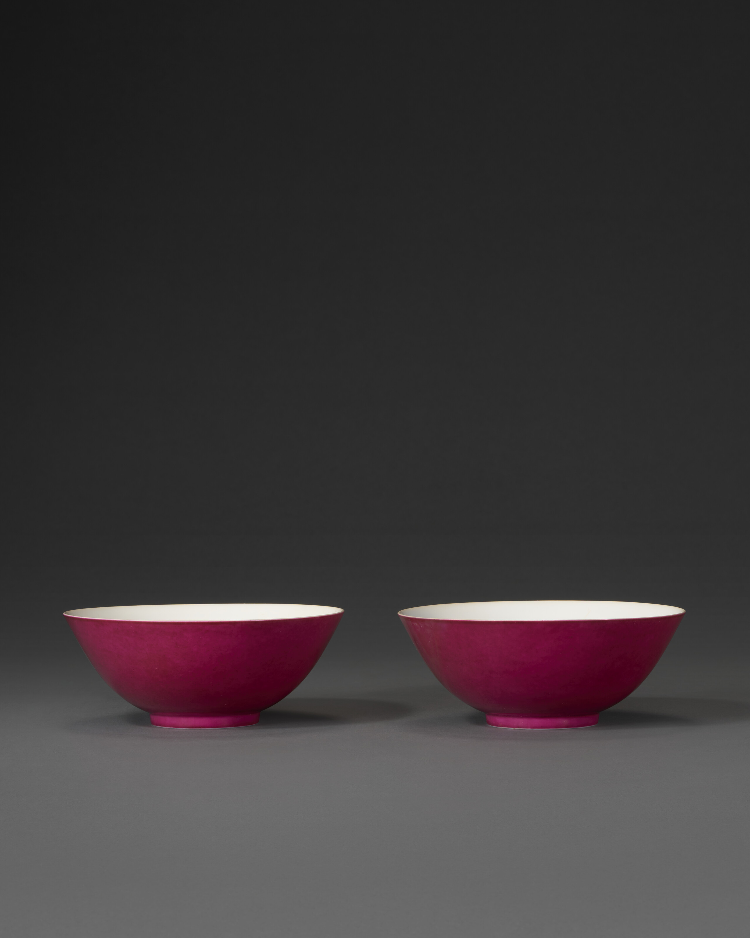 A Very Rare Pair Of Ruby-red-enameled Bowls — QIANLONG SEAL MARK IN UNDERGLAZE BLUE AND OF THE PERIOD (1736-1795)