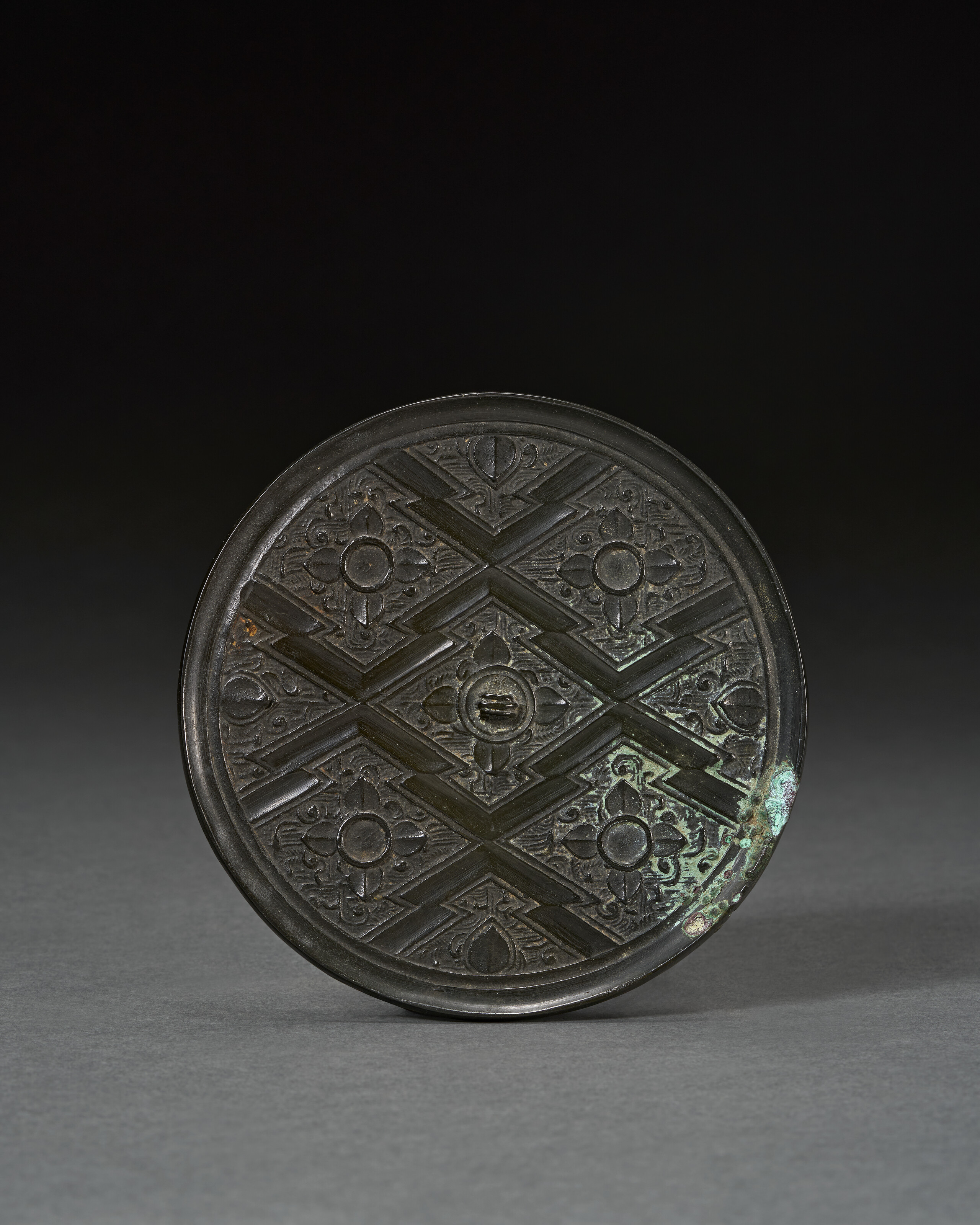 A Small Bronze Circular Mirror With Diamond-shaped Design — LATE WARRING STATES PERIOD, 4TH-3RD CENTURY BC