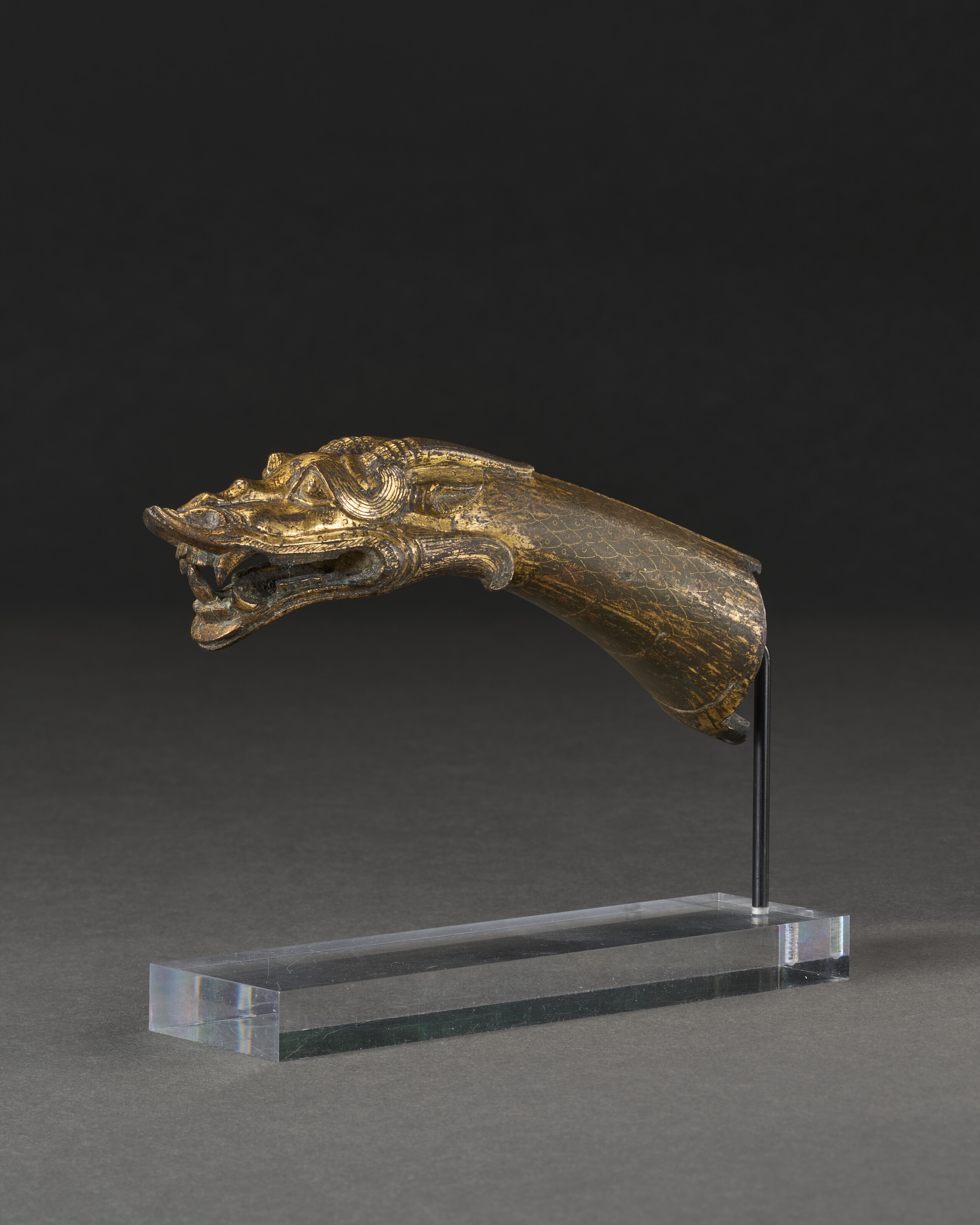 A Gilt-bronze Dragon-head Finial — HAN DYNASTY (206 BC-AD 220)