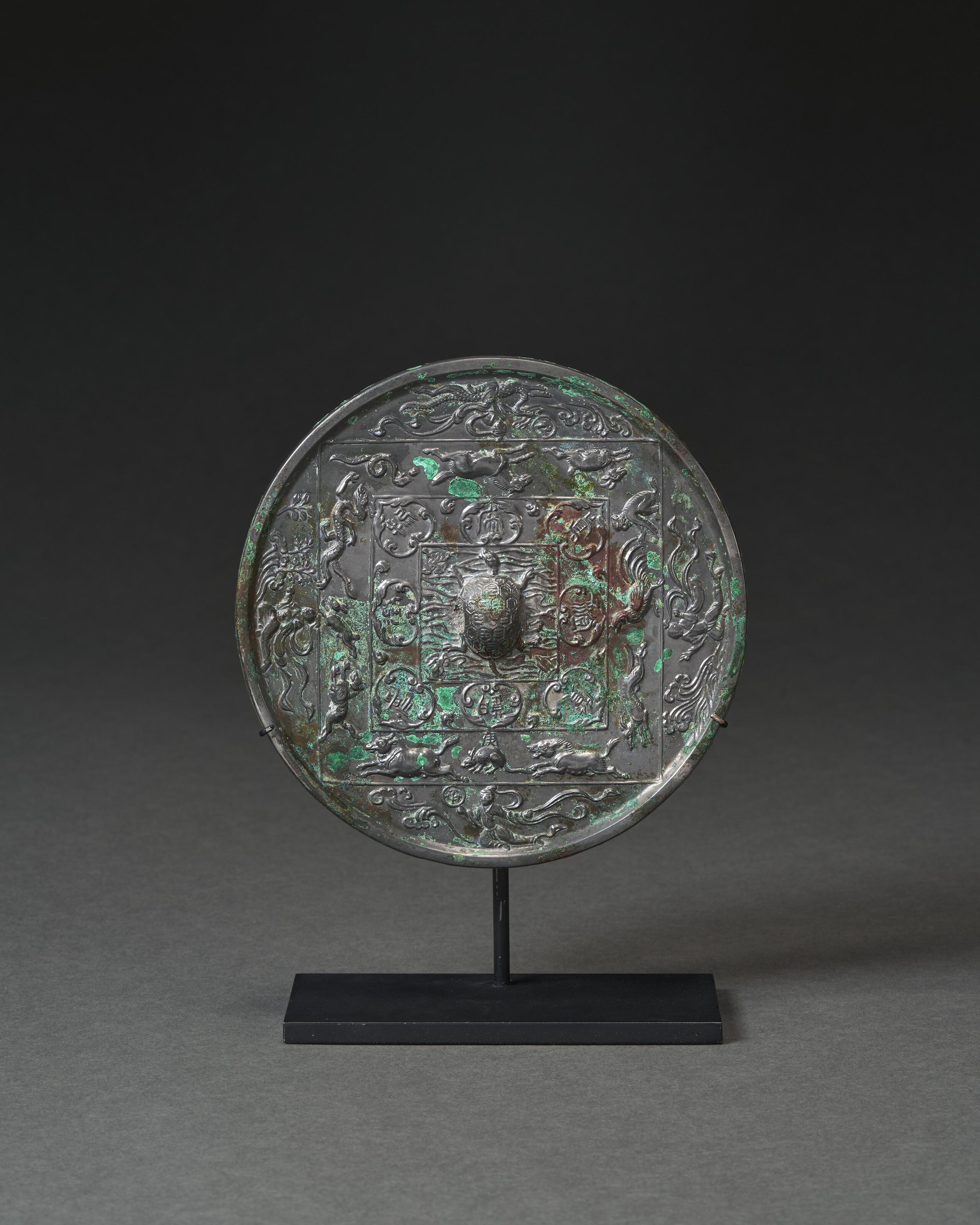 A Silvery-bronze Circular 'zodiac' Mirror — TANG DYNASTY (AD 618-907)
