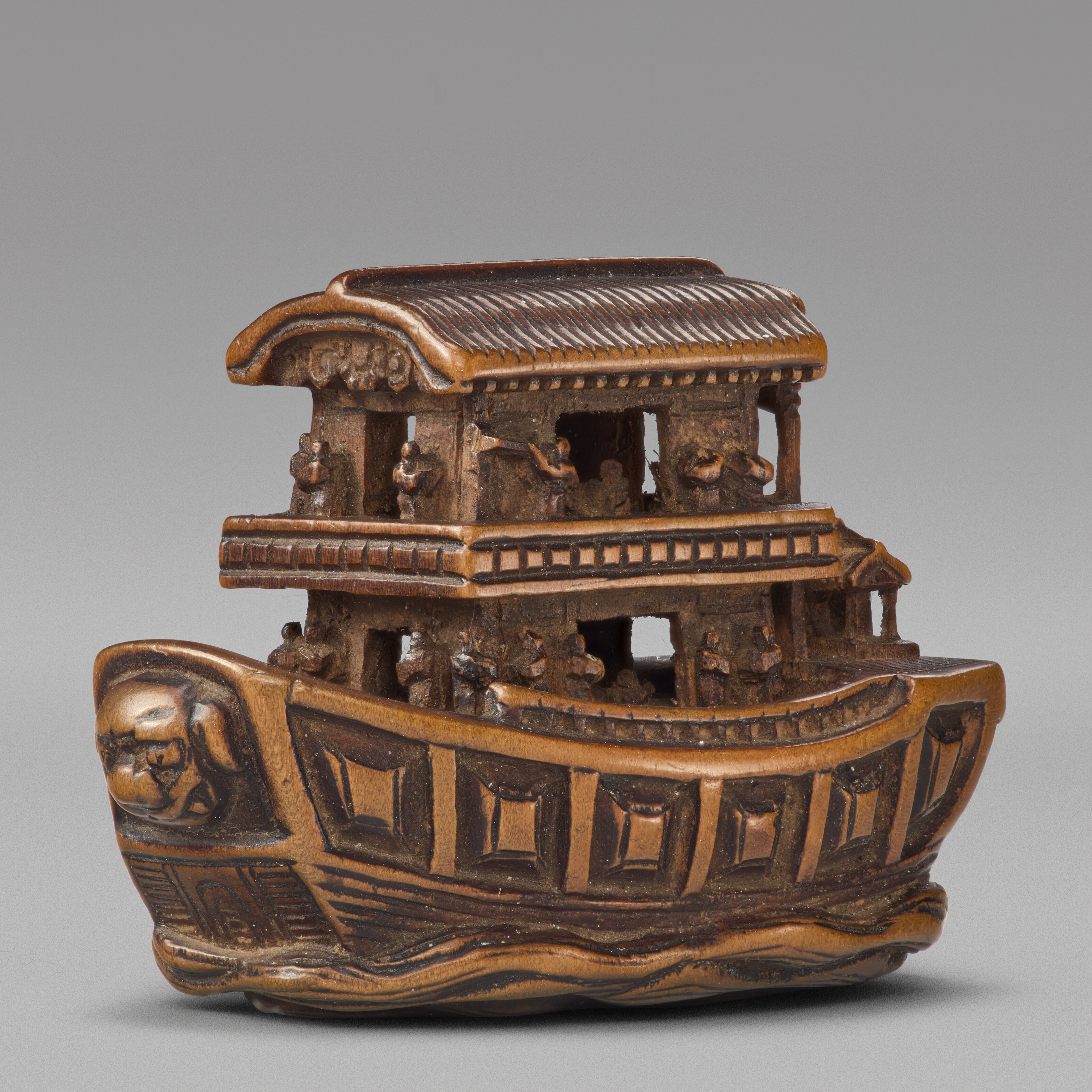 A Carved Wood Netsuke Miniature Sculpture Of Boat — EDO PERIOD (19TH CENTURY), SIGNED KAGETOSHI