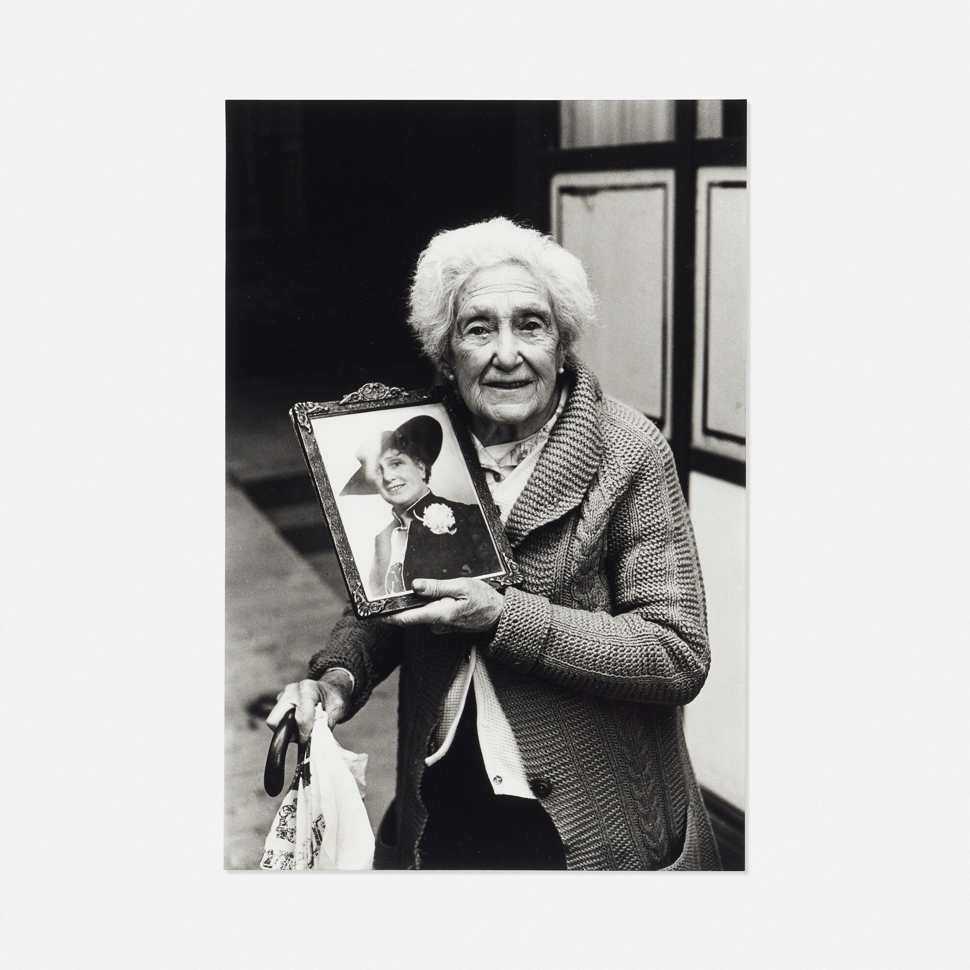 Paz Errázuriz — Woman with her permanently missing daughter's portrait